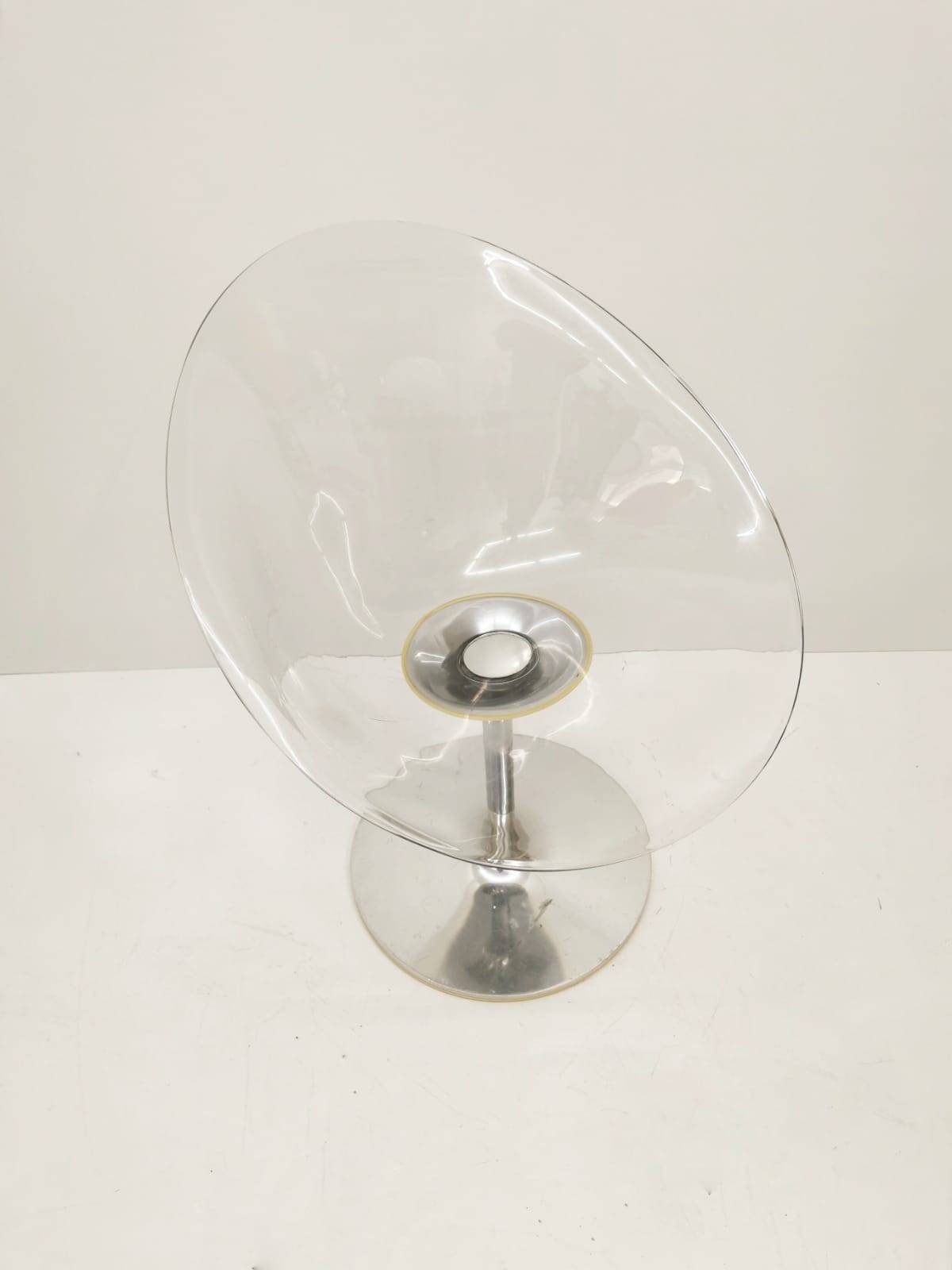 1 of 2 Transparent Eros chair with aluminum swivel base by Philippe Starck for Kartell. Made in Italy.
