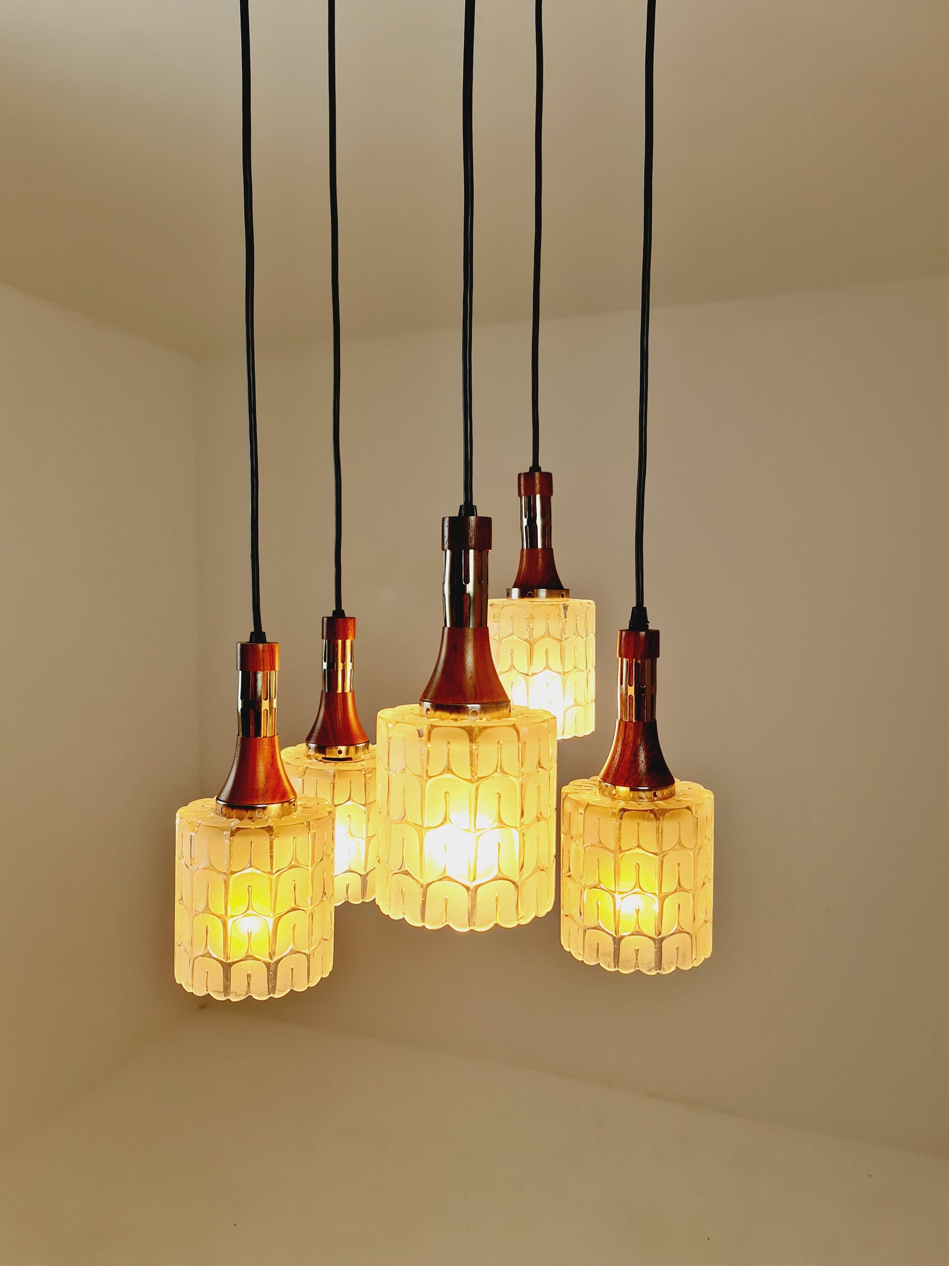 Rosewood and glass pendant lamp, Doria light fixture, with five Murano textured glass tube pendants, 1970s