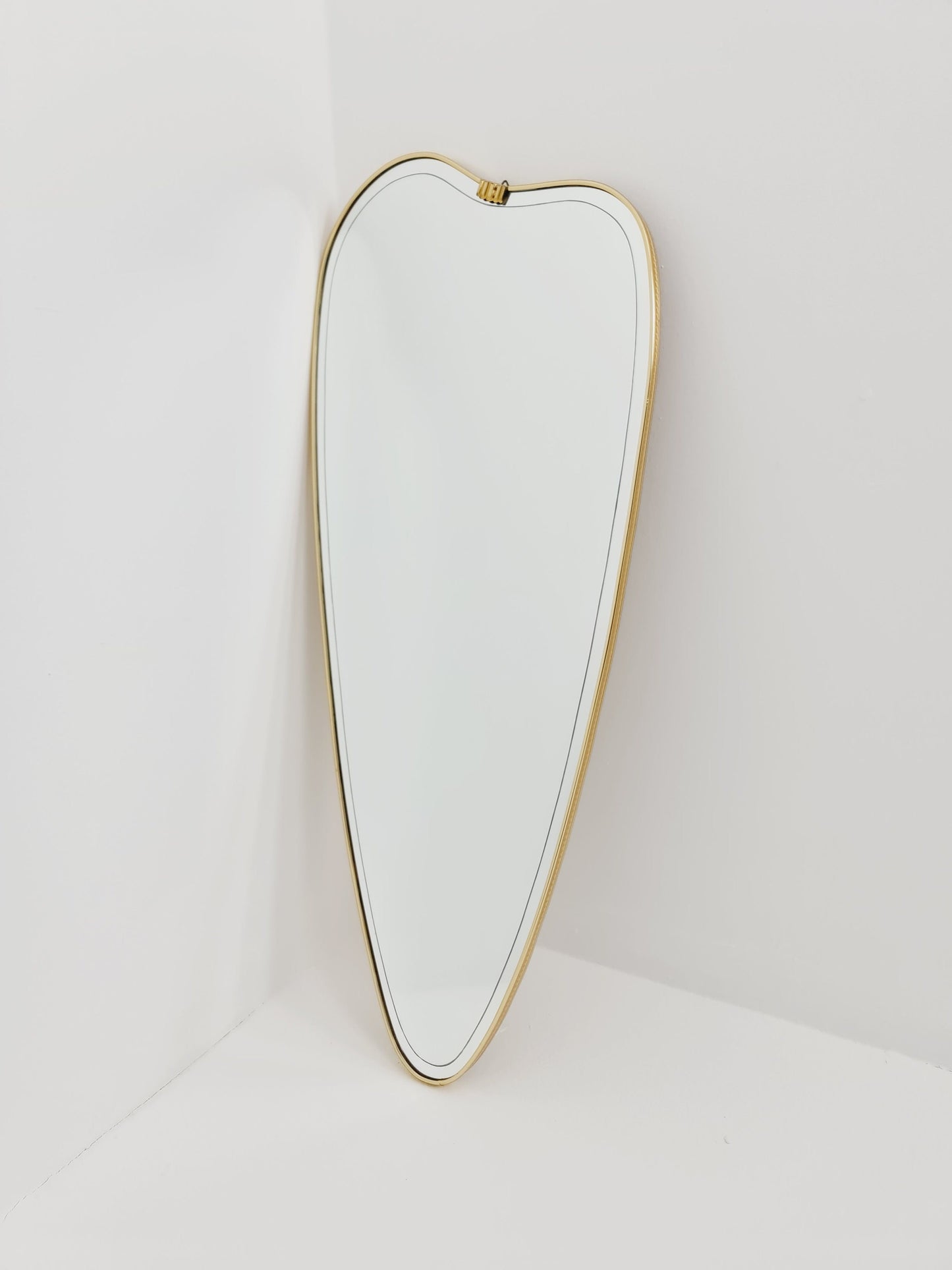 Mid Century asymmetric German brass Original kidney wall mirror from the 60s model Rockabilly