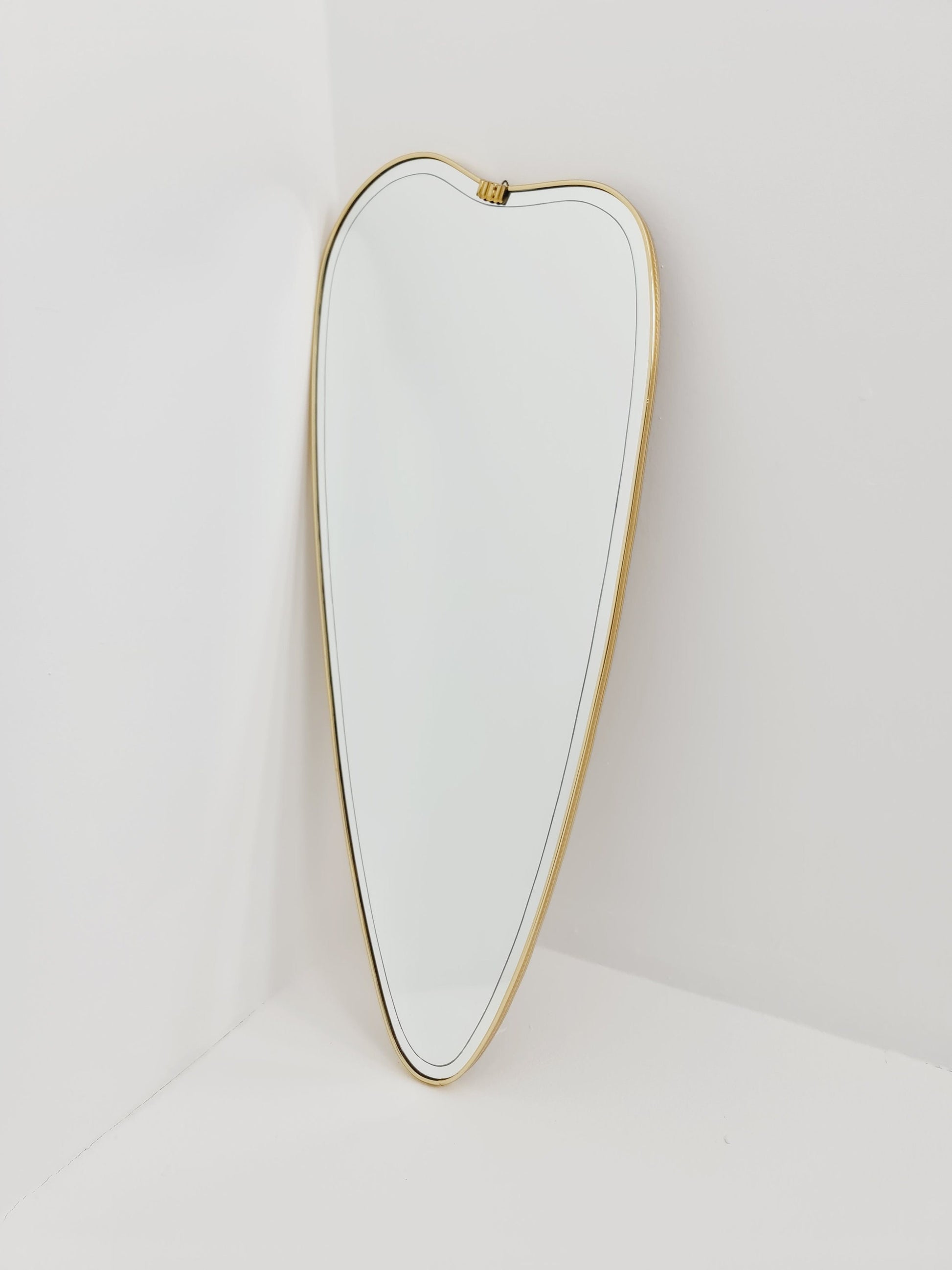 Mid Century asymmetric German brass Original kidney wall mirror from the 60s model Rockabilly