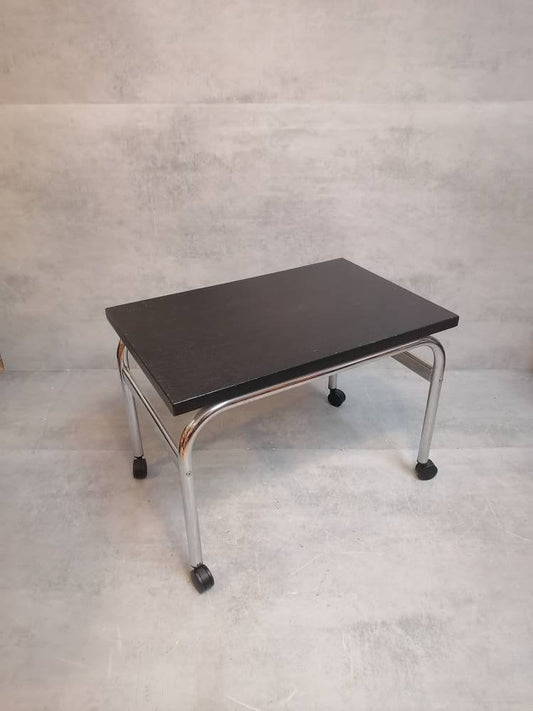 Mid-century modern Bauhaus design coffee table on wheels. 1980s Italy