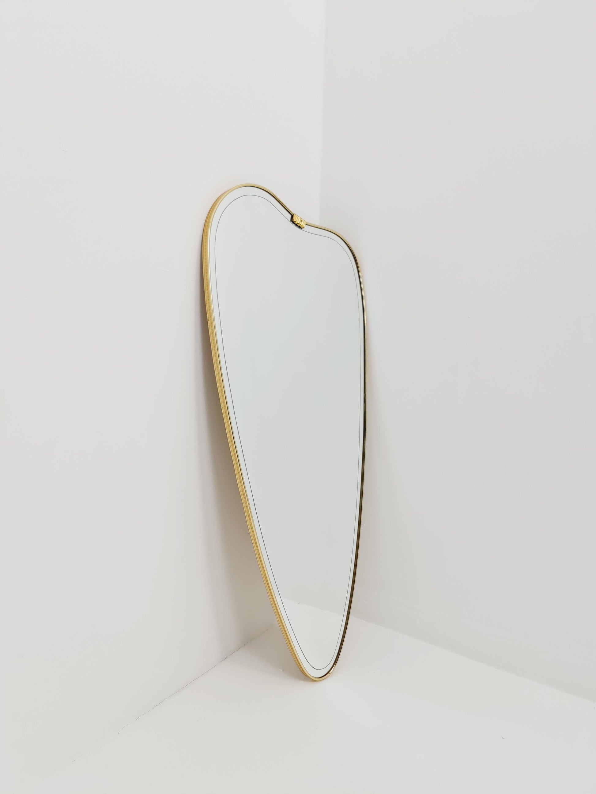 Mid Century asymmetric German brass Original kidney wall mirror from the 60s model Rockabilly