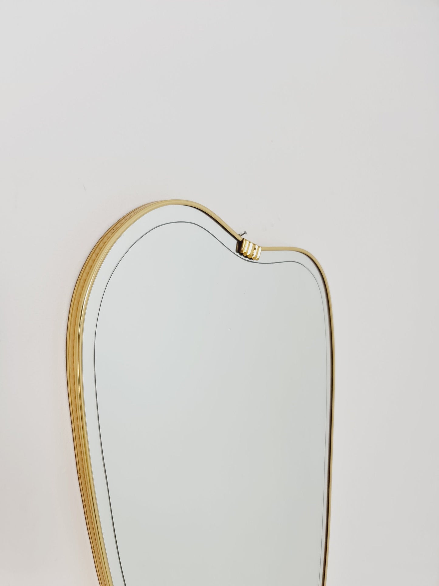 Mid Century asymmetric German brass Original kidney wall mirror from the 60s model Rockabilly