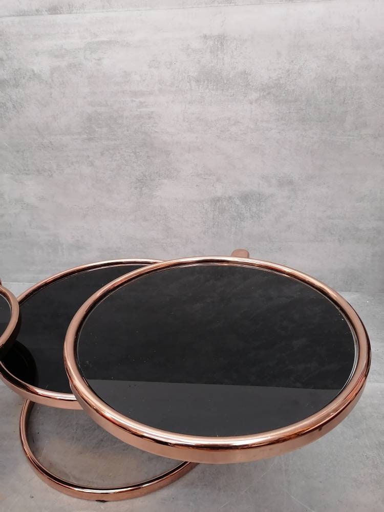 Mid-century rose gold and black glass 3-tier swivel coffee table by Milo Baughman bauhaus