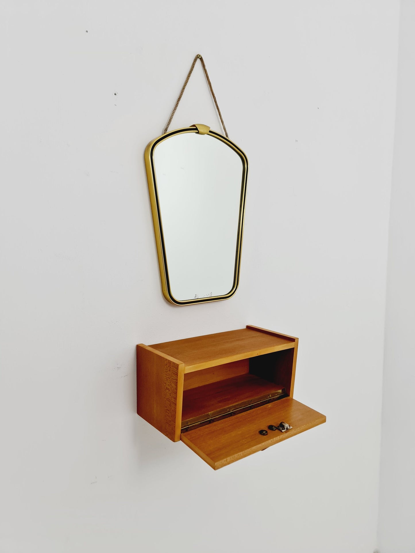 Mid Century asymmetric German brass Original kidney wall mirror with shelf from the 60s model Rockabilly