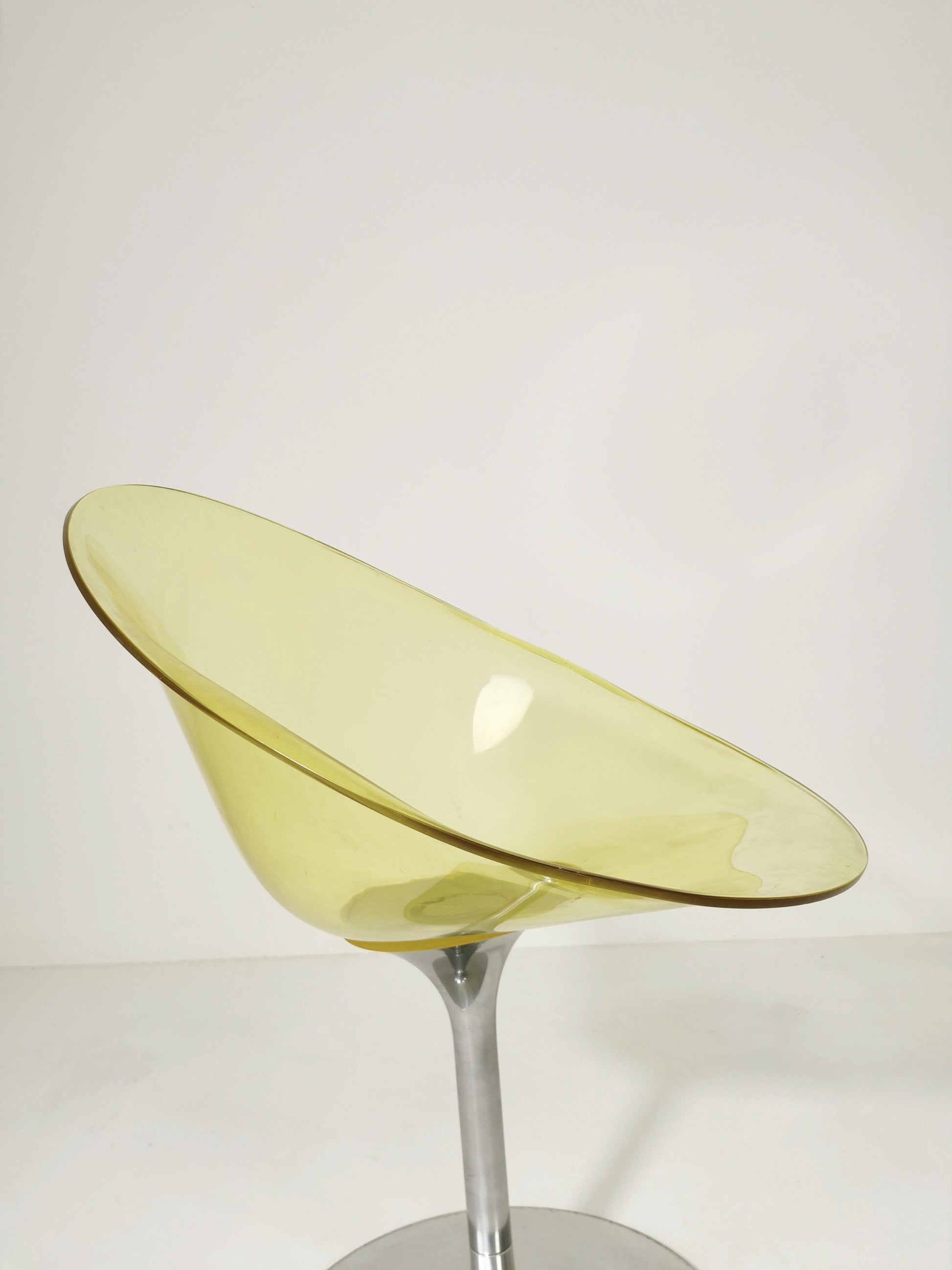yellow Eros chair with aluminum swivel base by Philippe Starck for Kartell. Italy.