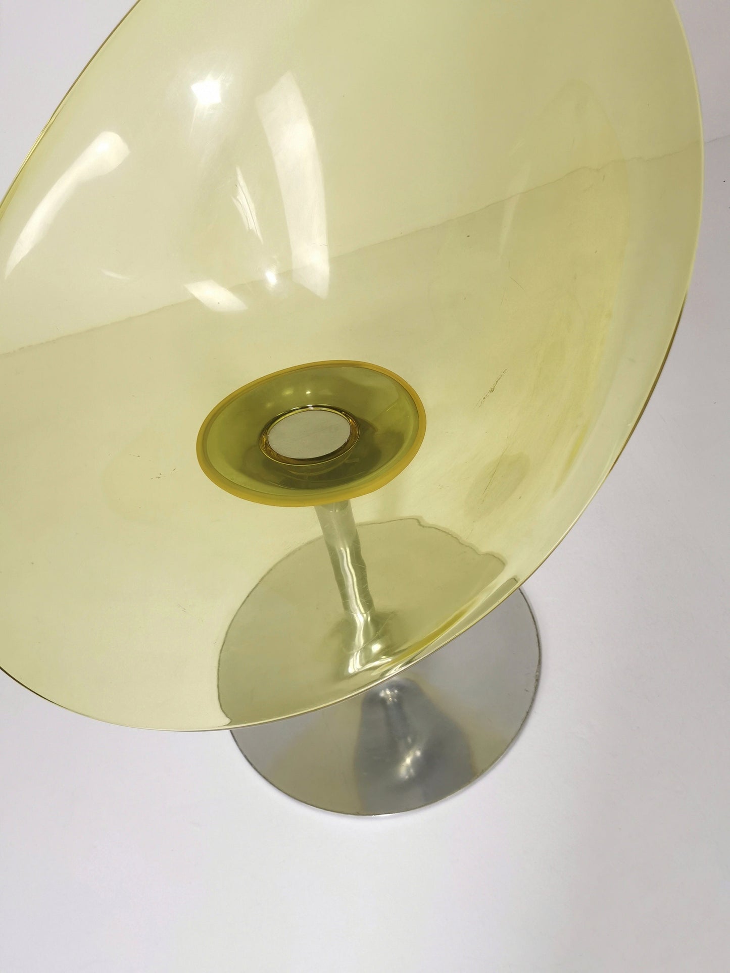 yellow Eros chair with aluminum swivel base by Philippe Starck for Kartell. Italy.