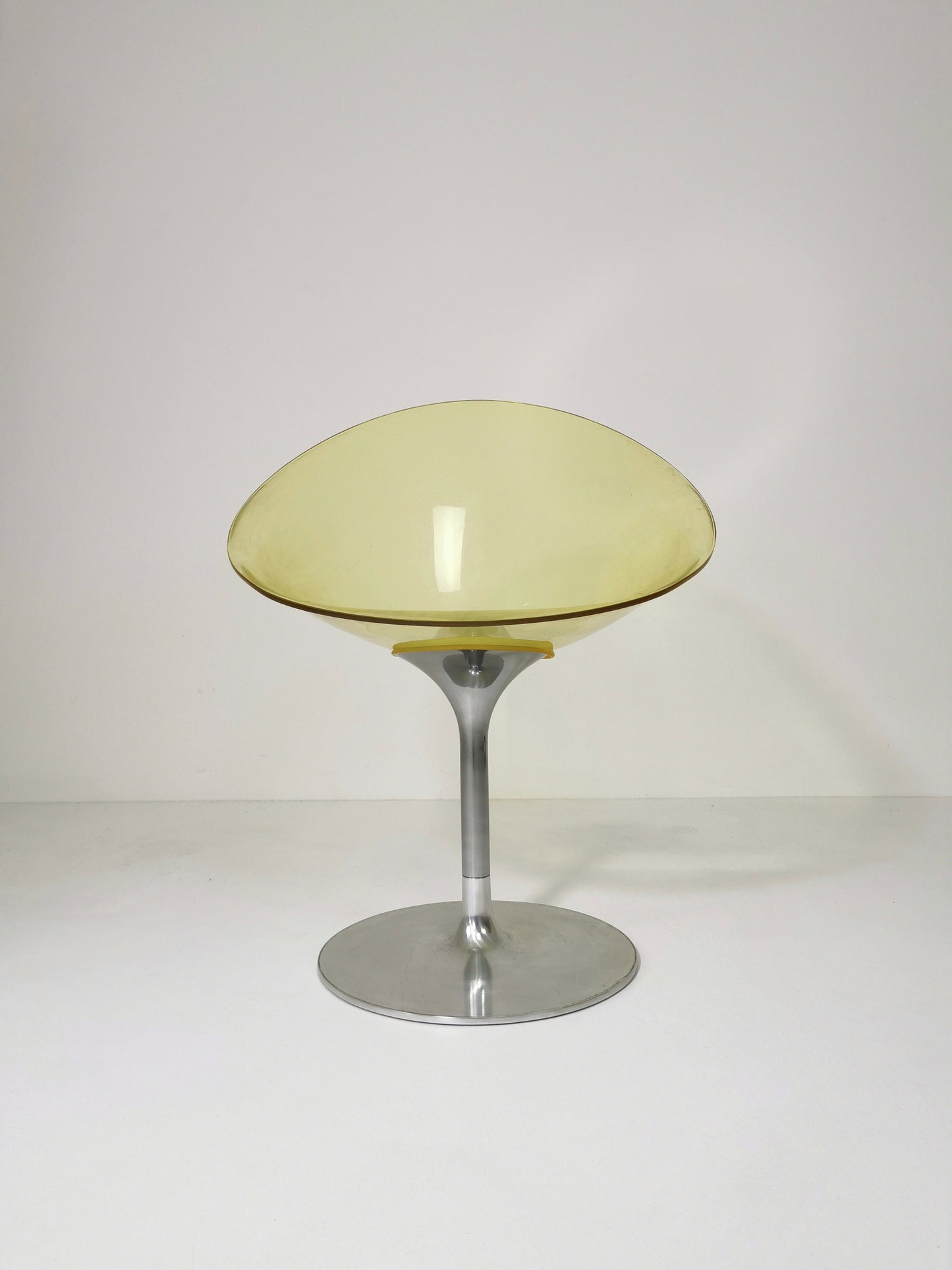 yellow Eros chair with aluminum swivel base by Philippe Starck for Kartell. Italy.
