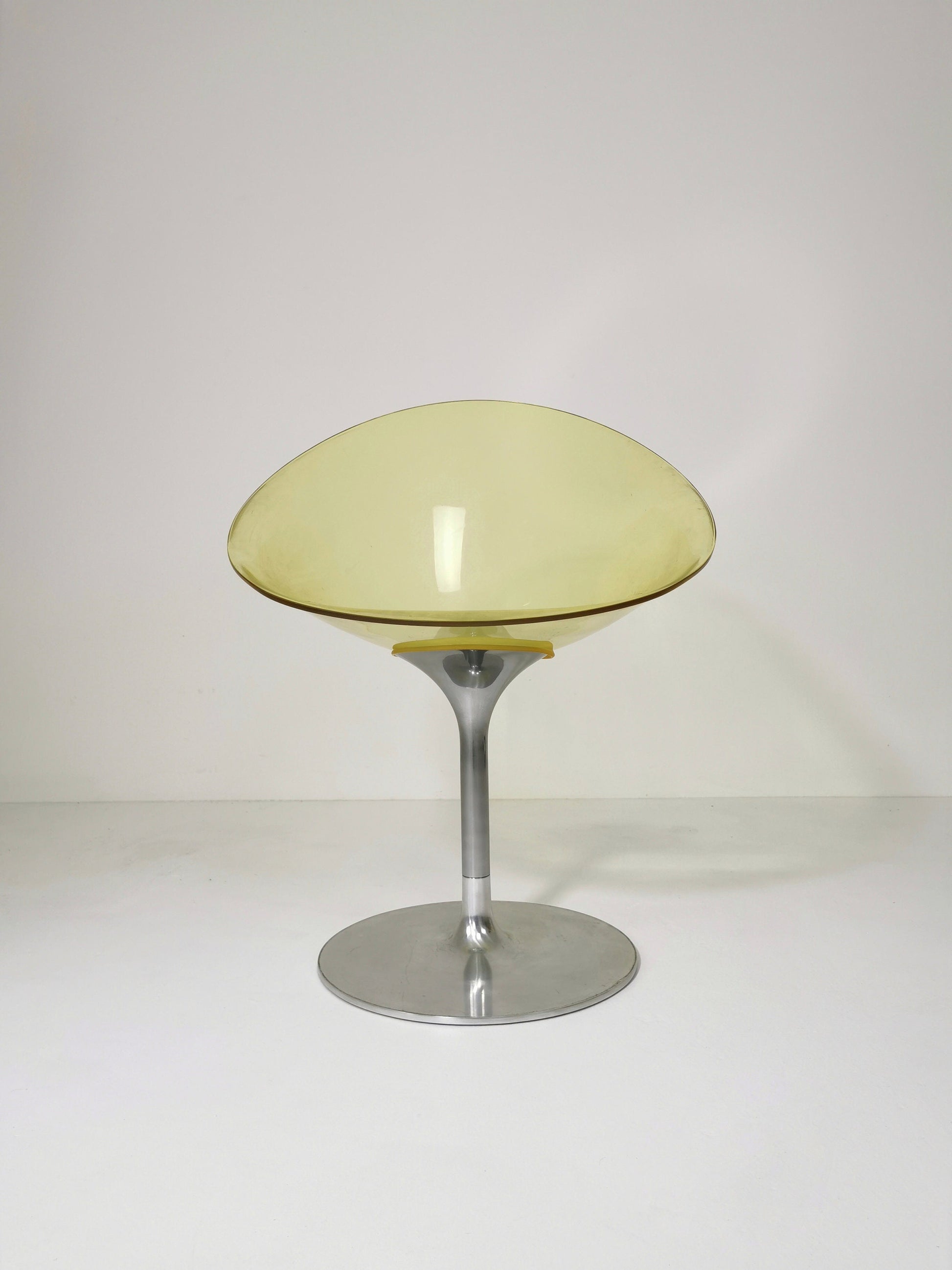 yellow Eros chair with aluminum swivel base by Philippe Starck for Kartell. Italy.