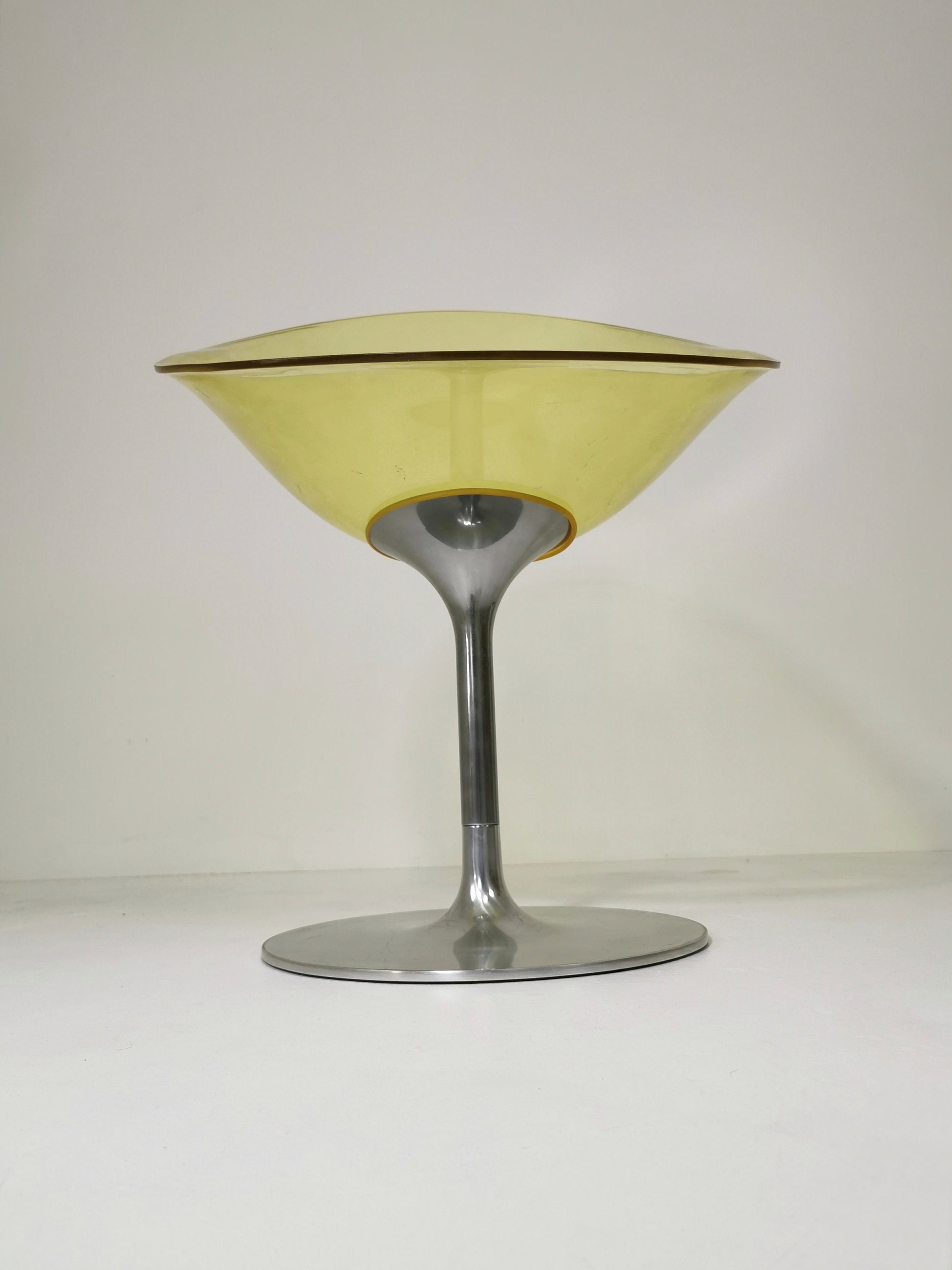 yellow Eros chair with aluminum swivel base by Philippe Starck for Kartell. Italy.