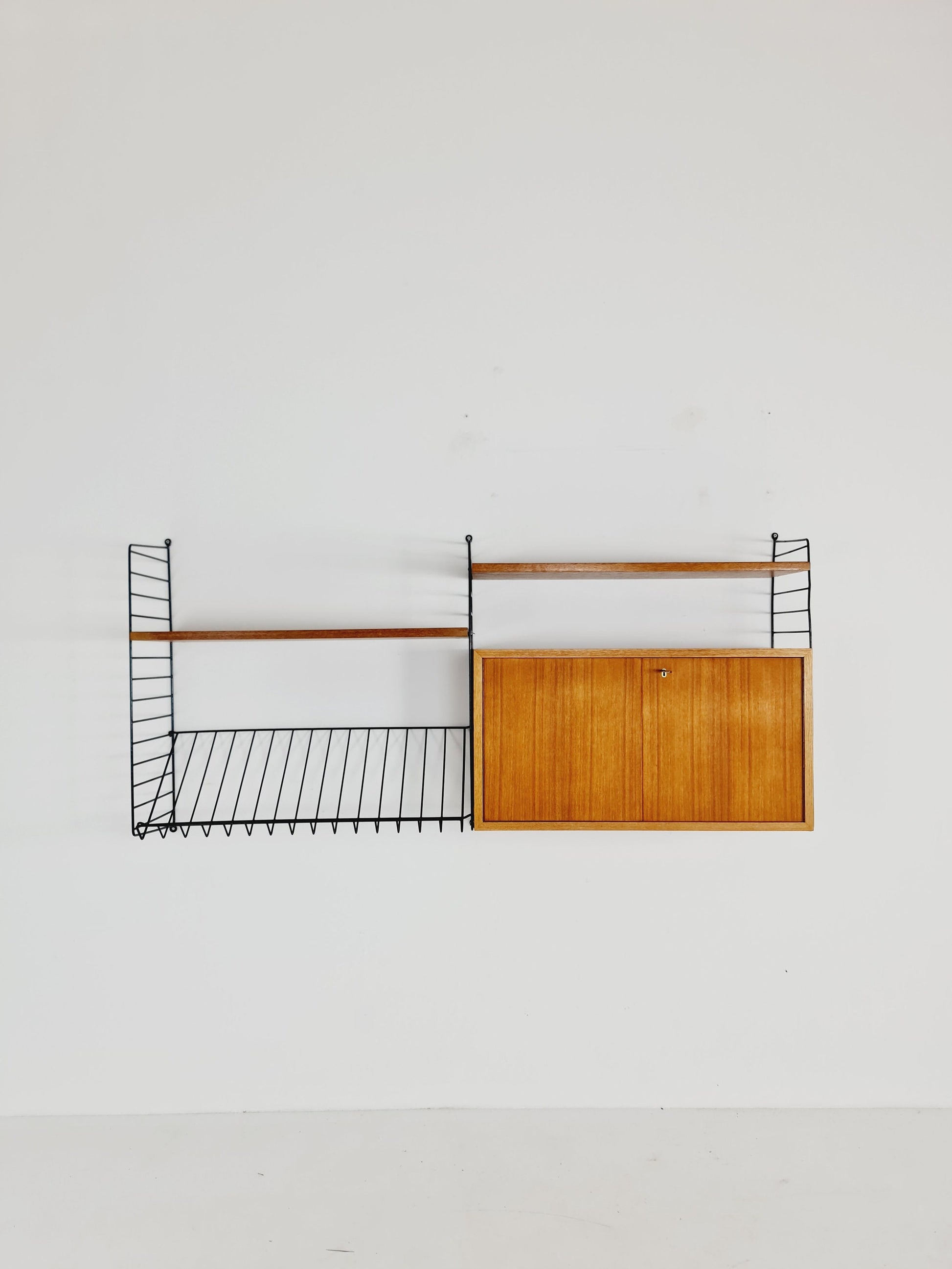 Wall-mounted original Swedish string shelf-system, bookcase cabinet teak by Nils & Kajsa Strinning, 1960s