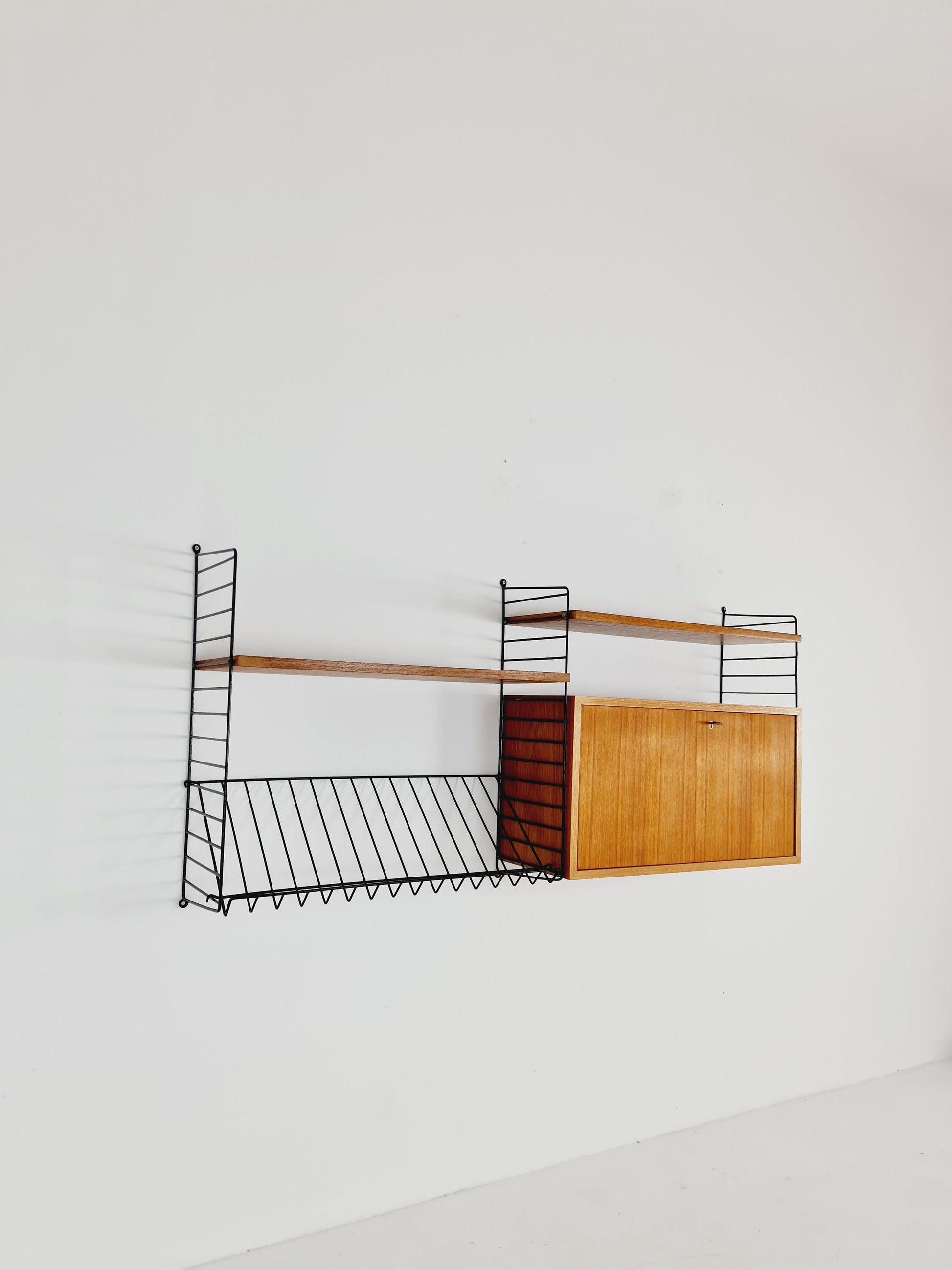 Wall-mounted original Swedish string shelf-system, bookcase cabinet teak by Nils & Kajsa Strinning, 1960s