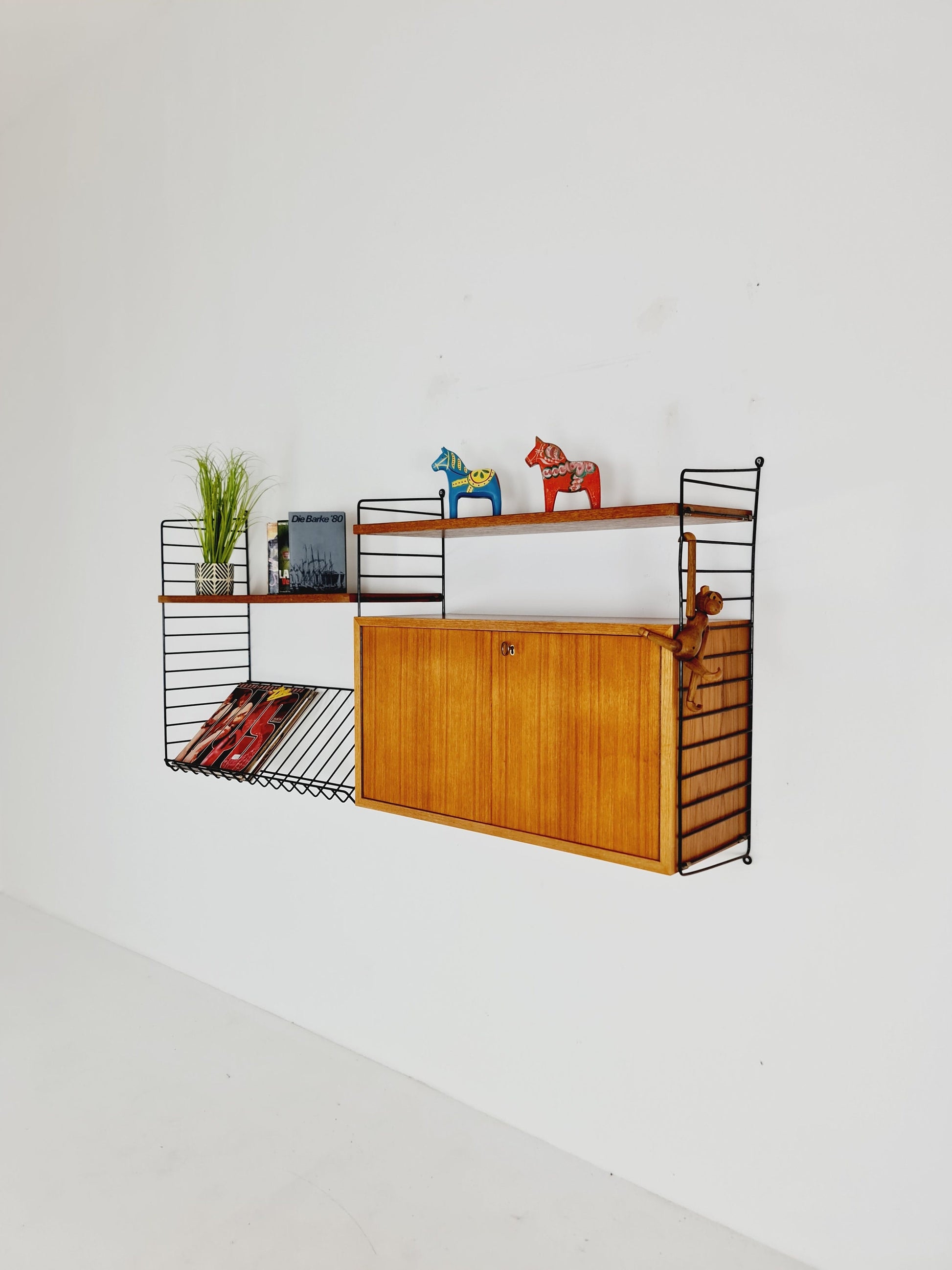 Wall-mounted original Swedish string shelf-system, bookcase cabinet teak by Nils & Kajsa Strinning, 1960s