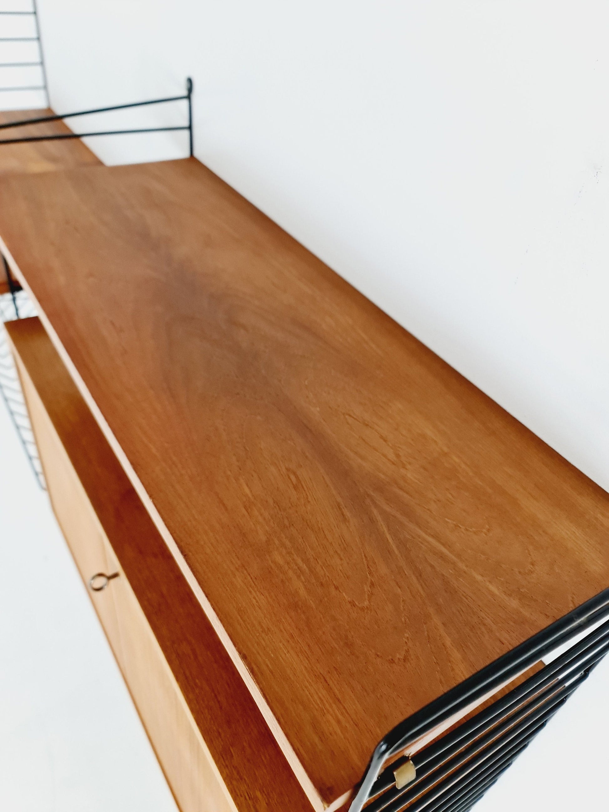 Wall-mounted original Swedish string shelf-system, bookcase cabinet teak by Nils & Kajsa Strinning, 1960s