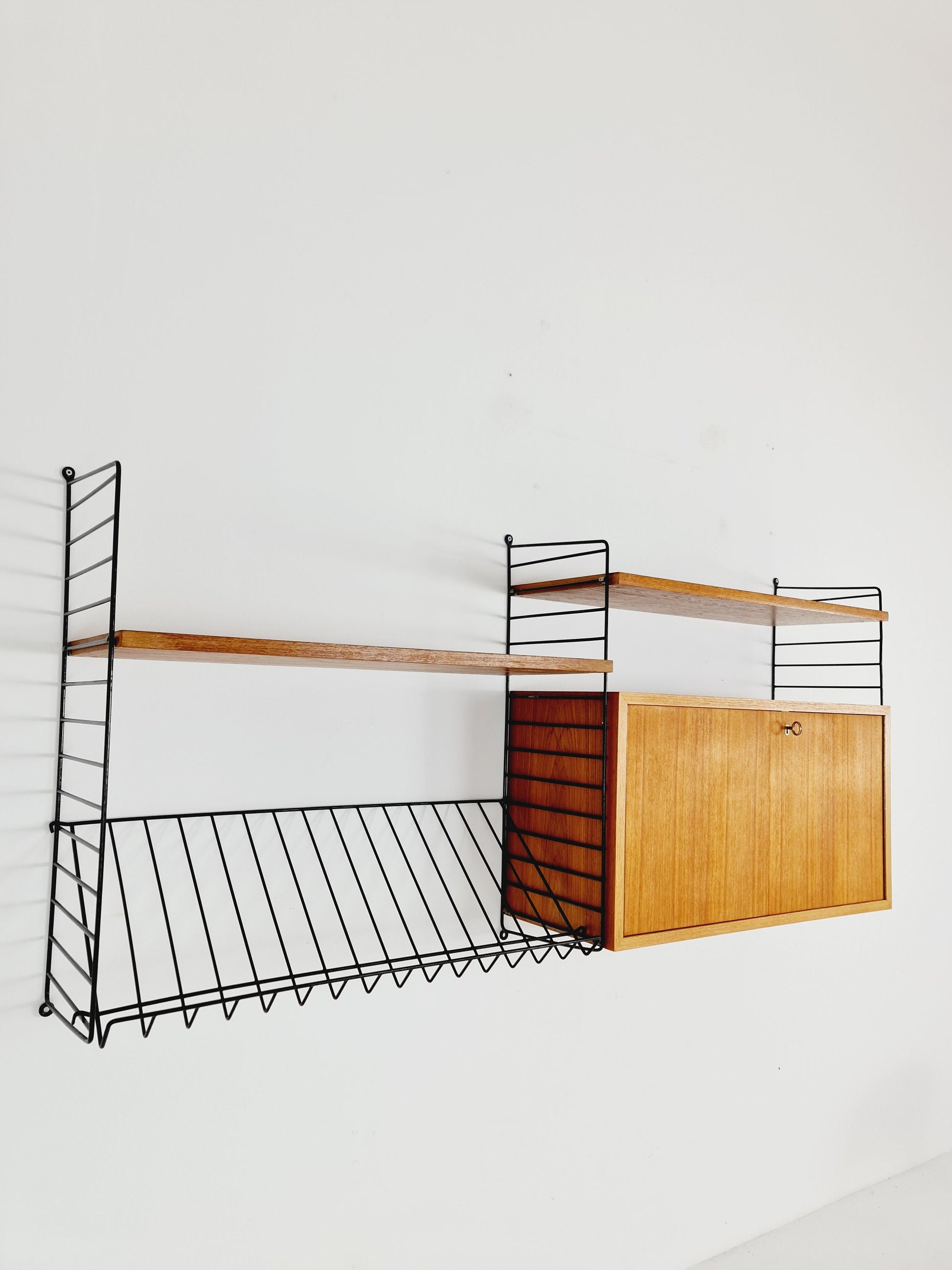 Wall-mounted original Swedish string shelf-system, bookcase cabinet teak by Nils & Kajsa Strinning, 1960s