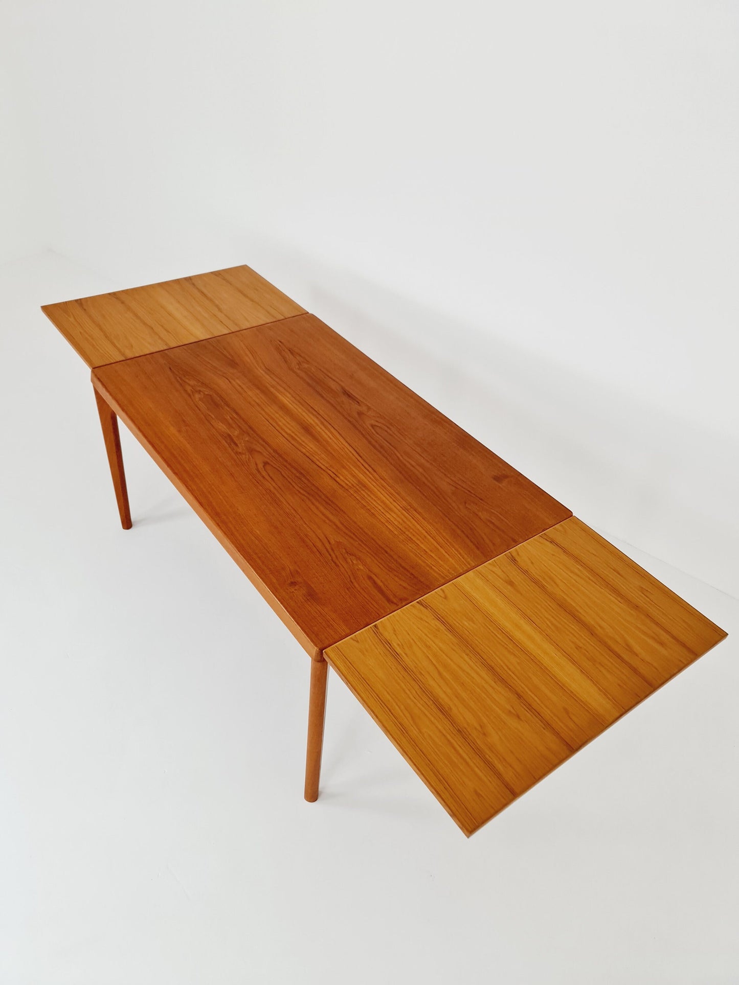 Danish Henning Kjaernulf rectangular teak table with two extension leaves, Denmark 1960s