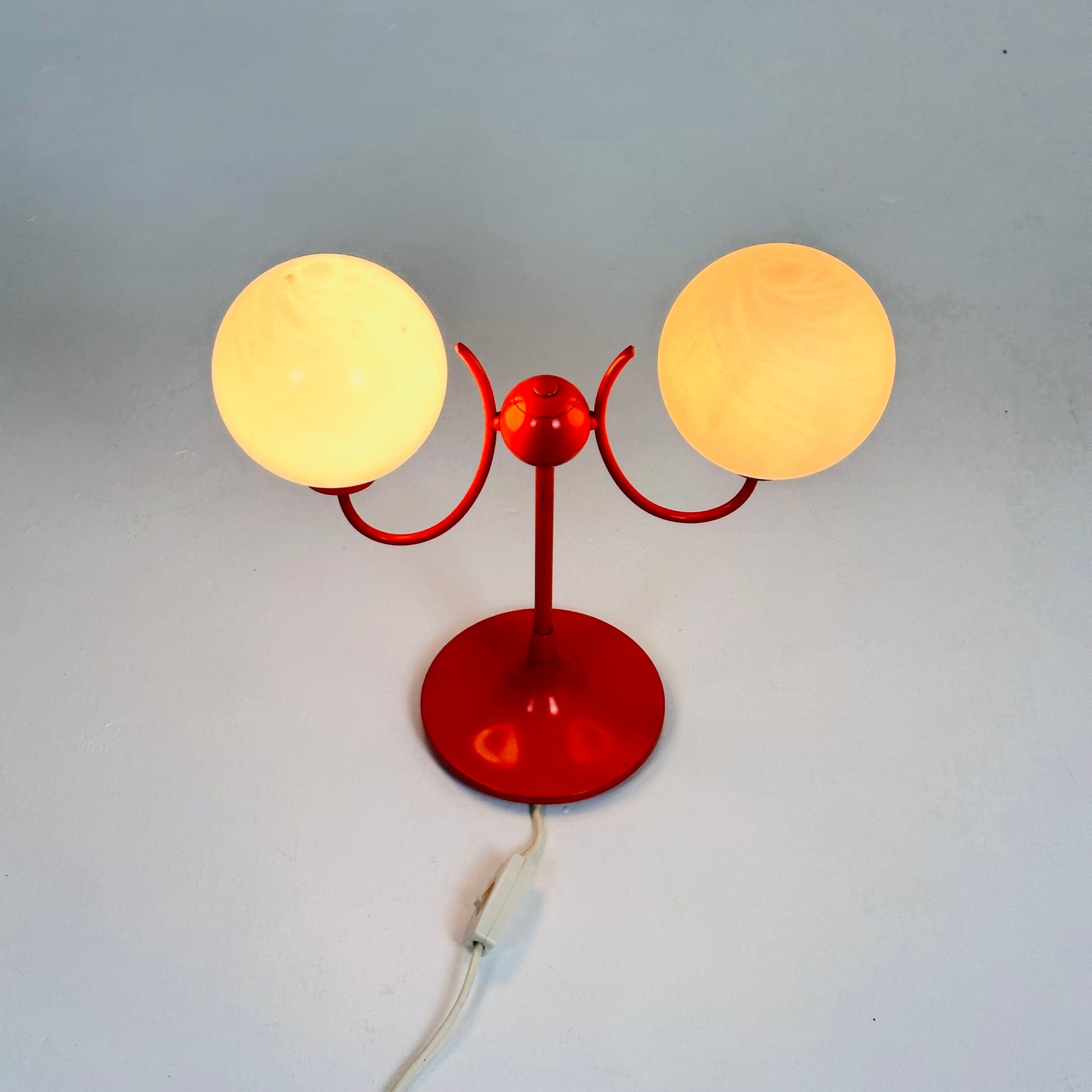 Opaline glass, orange tulip shaped base makes this stunning space age mid century table lamp . Made by Kaiser Leuchten, Germany 1970s