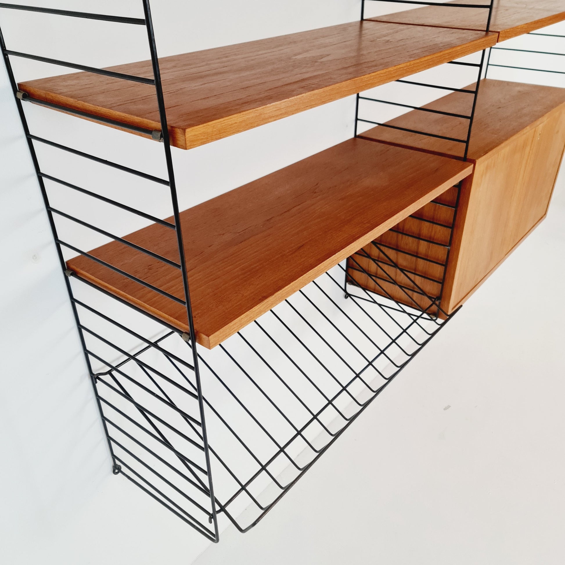 Wall-mounted original Swedish string shelf-system, drawers, bookcase teak by Nils & Kajsa Strinning, 1960s
