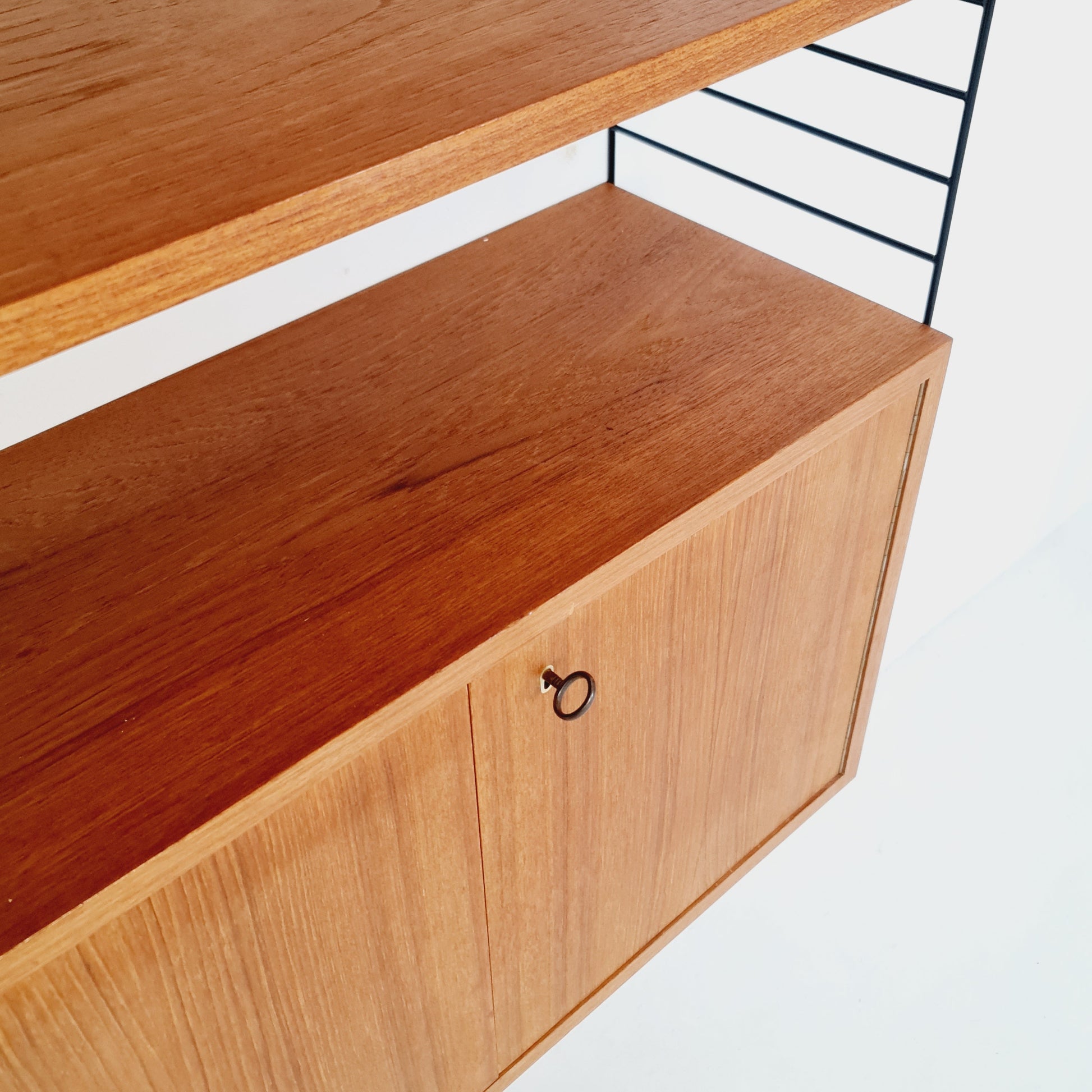 Wall-mounted original Swedish string shelf-system, drawers, bookcase teak by Nils & Kajsa Strinning, 1960s