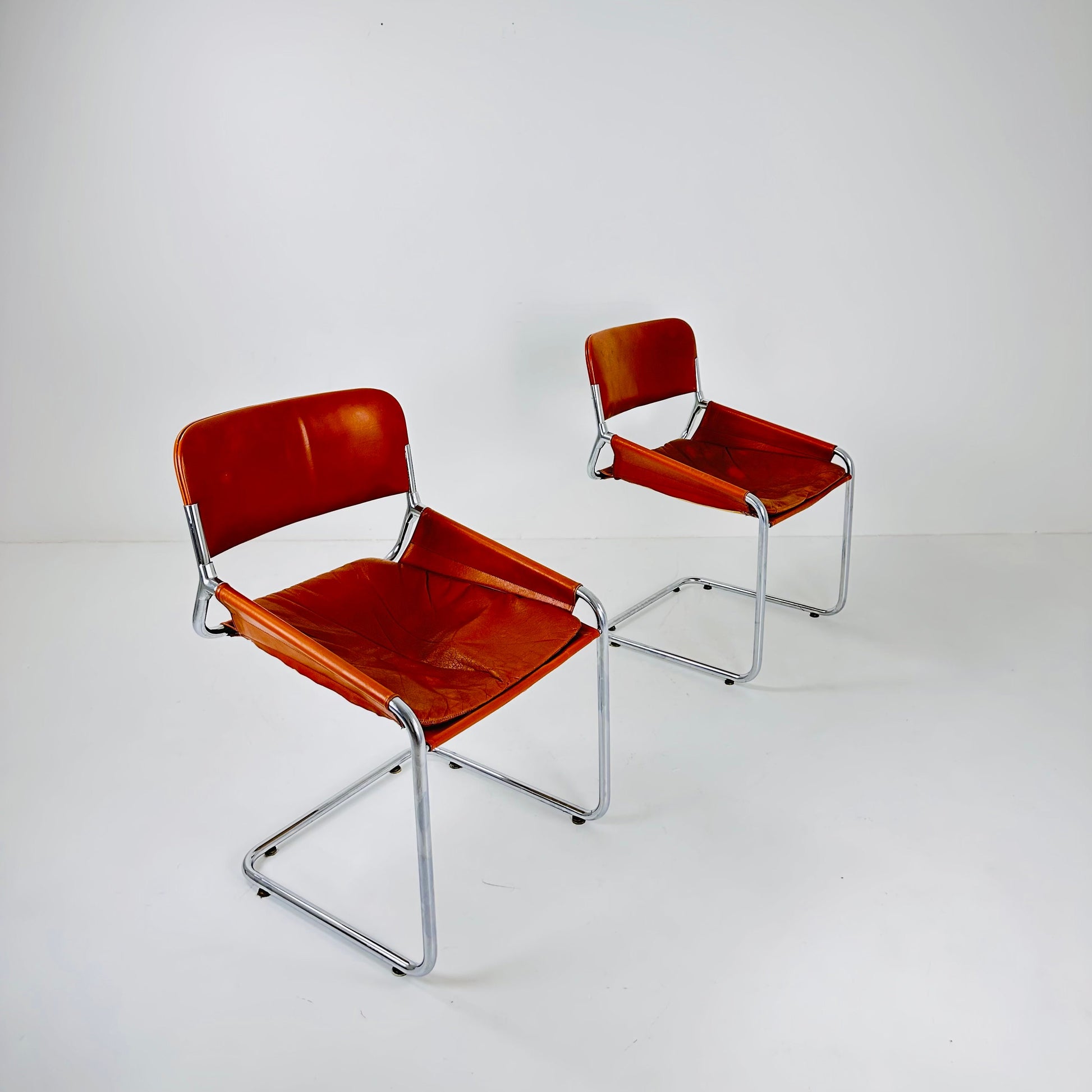 1 of 2 Italian Cognac Leather & Chrome Tubular Sling Chair | 1970s Mid-Century Modern