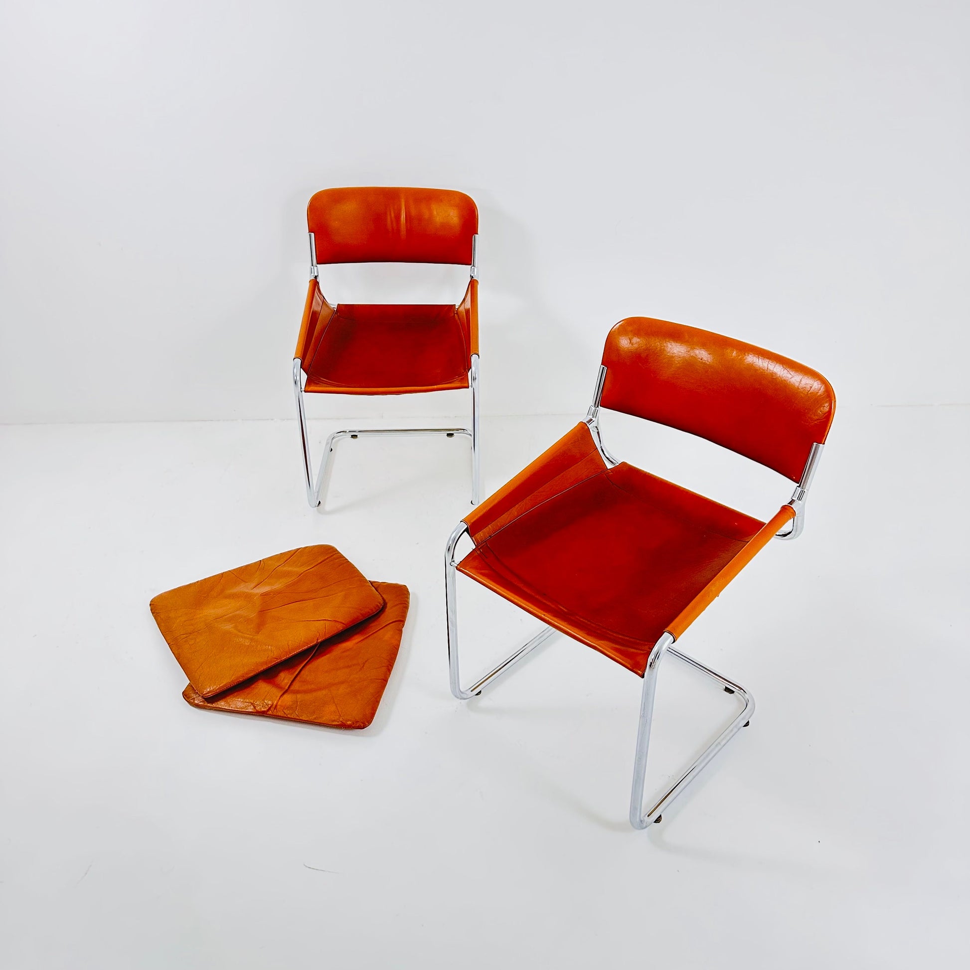 1 of 2 Italian Cognac Leather & Chrome Tubular Sling Chair | 1970s Mid-Century Modern