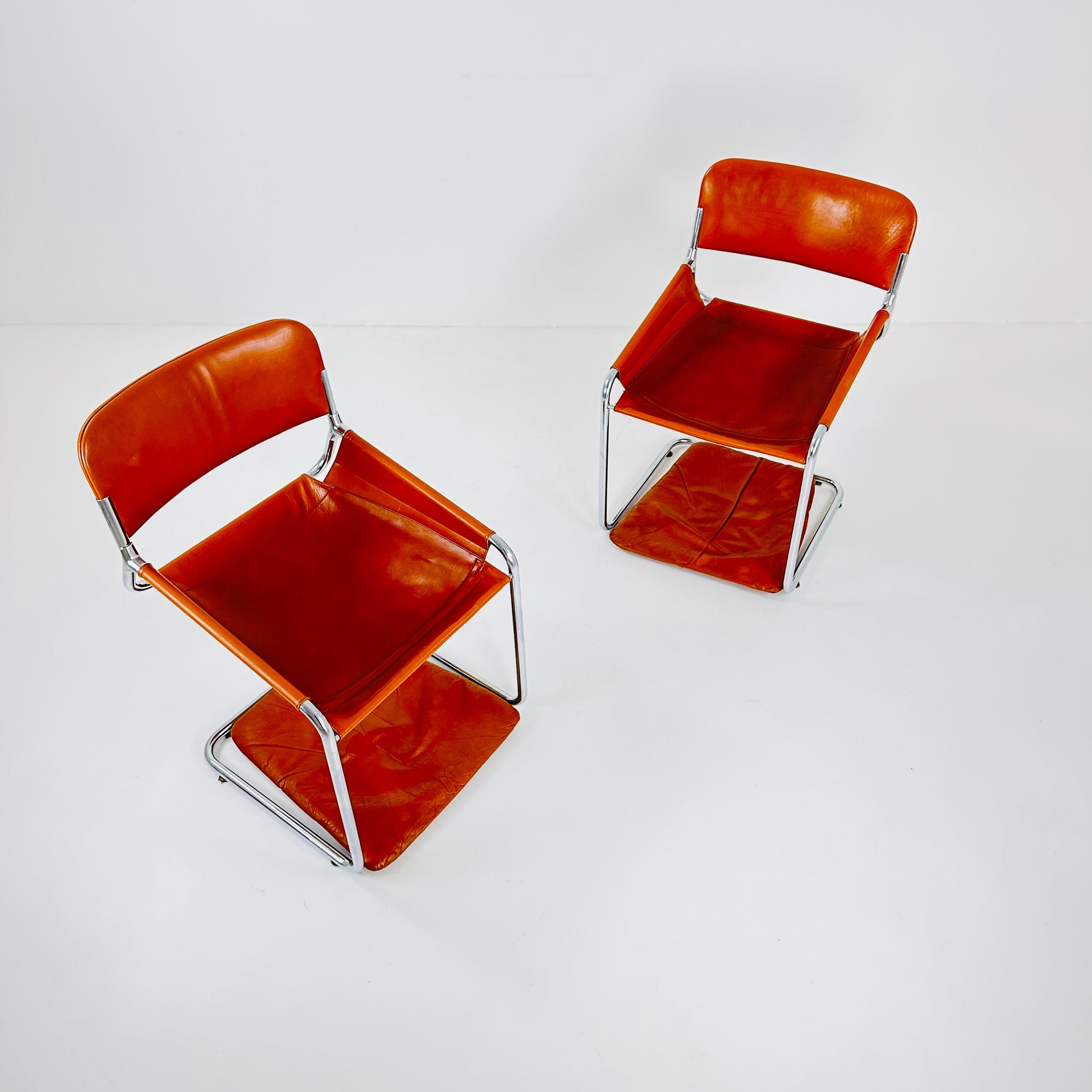 1 of 2 Italian Cognac Leather & Chrome Tubular Sling Chair | 1970s Mid-Century Modern