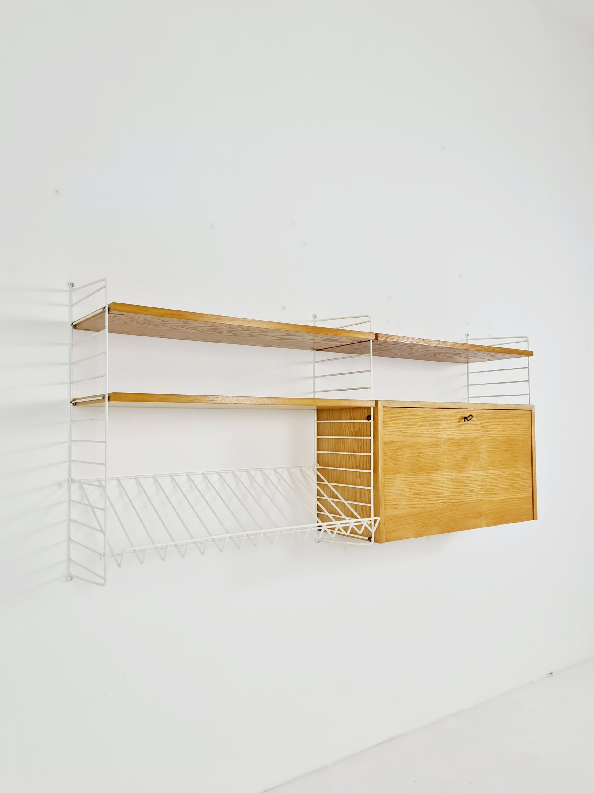 Wall-mounted original Swedish string shelf-system, bookcase cabinet Oak by Nils & Kajsa Strinning, 1960s