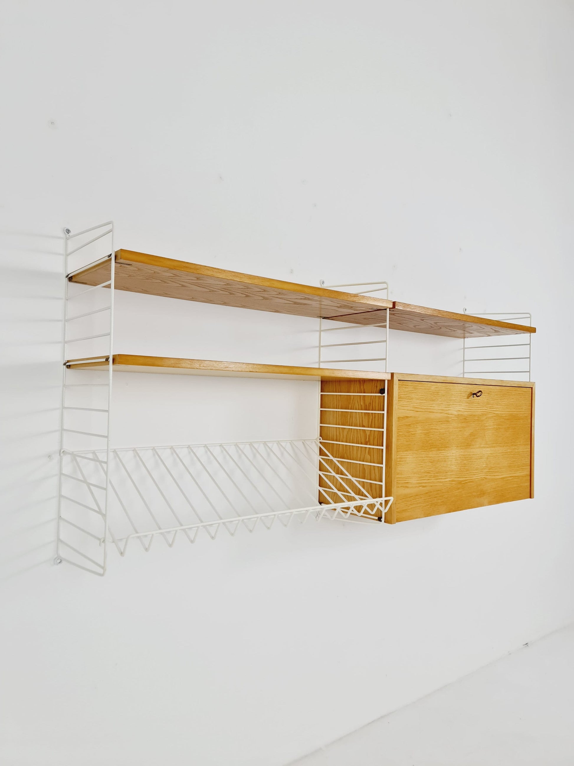 Wall-mounted original Swedish string shelf-system, bookcase cabinet Oak by Nils & Kajsa Strinning, 1960s