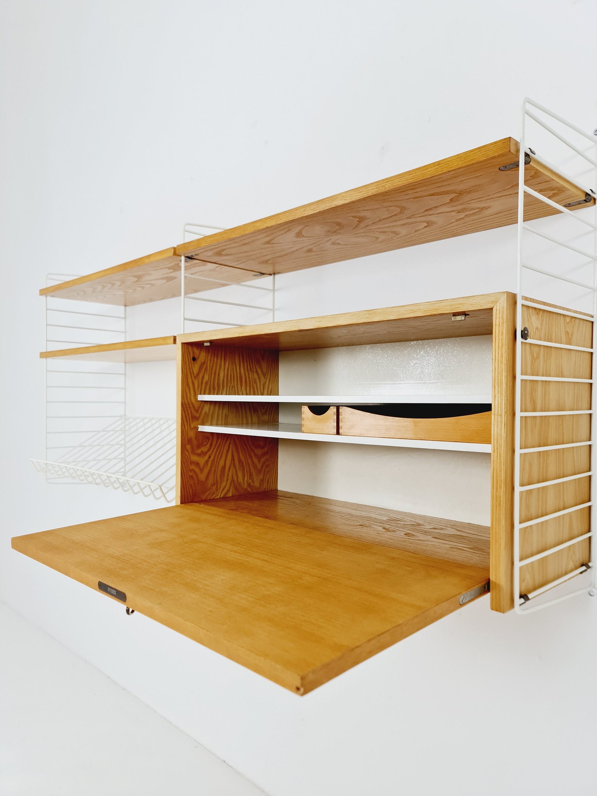 Wall-mounted original Swedish string shelf-system, bookcase cabinet Oak by Nils & Kajsa Strinning, 1960s