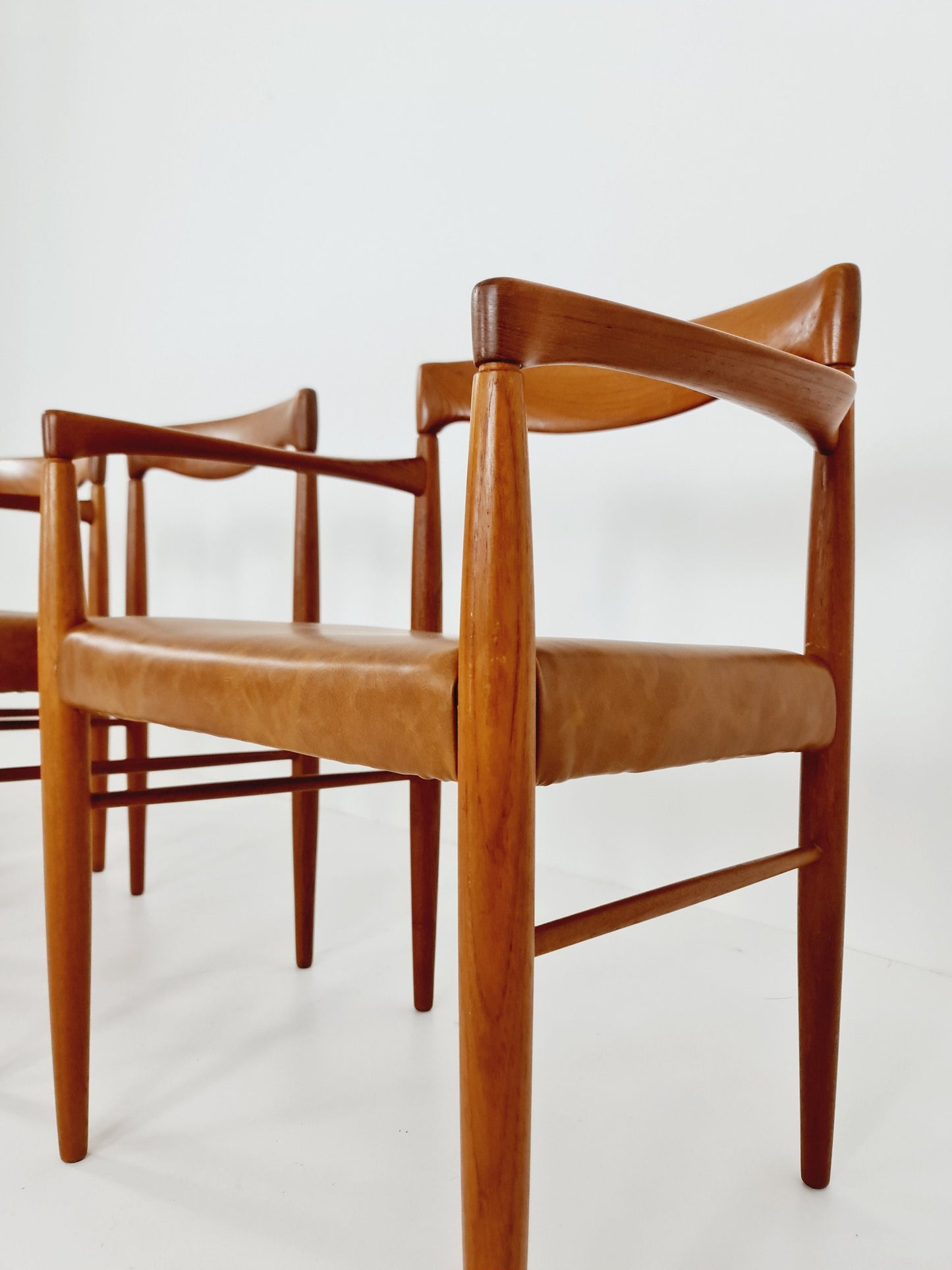 Danish teak & congac faux leder fabric dining chairs by H. W. Klein for Bramin, 1960s, set of 4