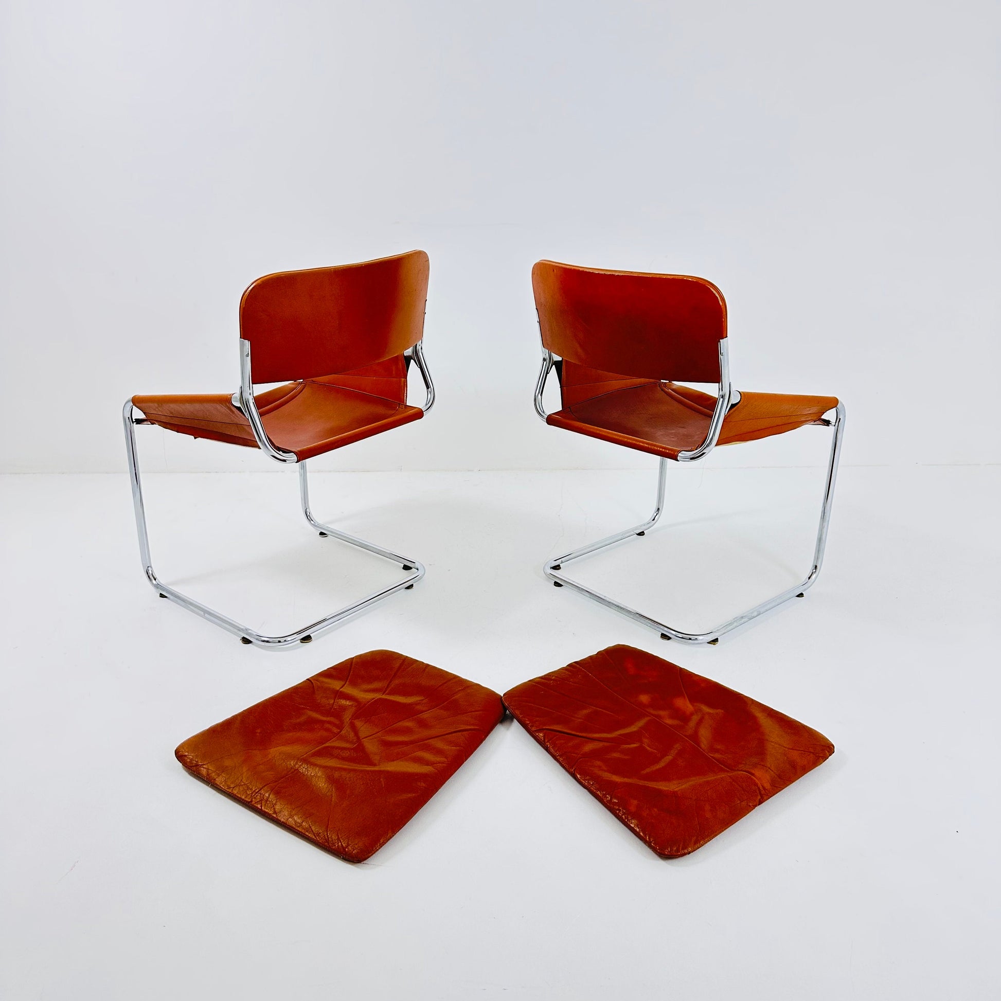 1 of 2 Italian Cognac Leather & Chrome Tubular Sling Chair | 1970s Mid-Century Modern