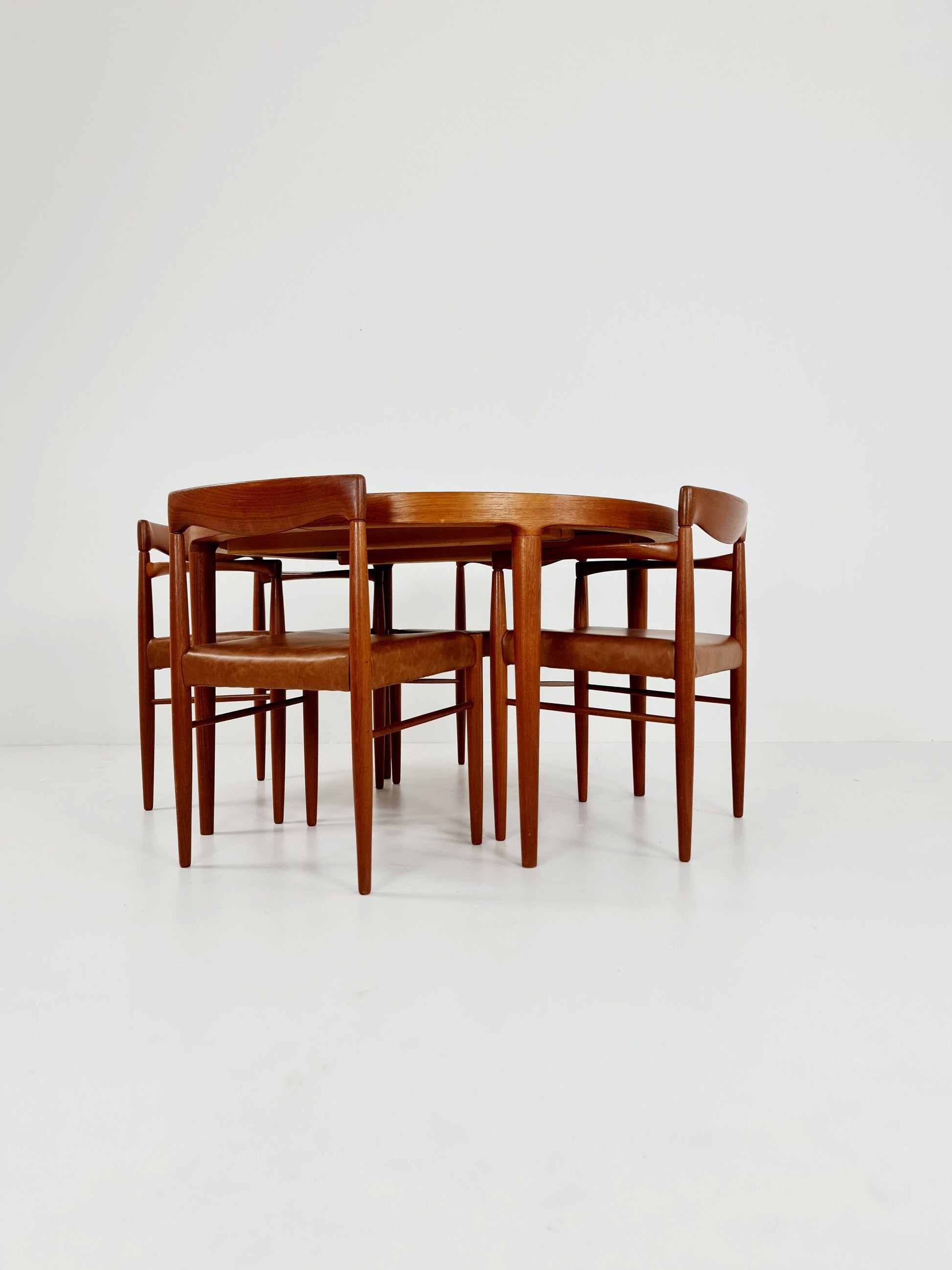 Danish teak & congac faux leder fabric dining chairs by H. W. Klein for Bramin, 1960s, set of 4