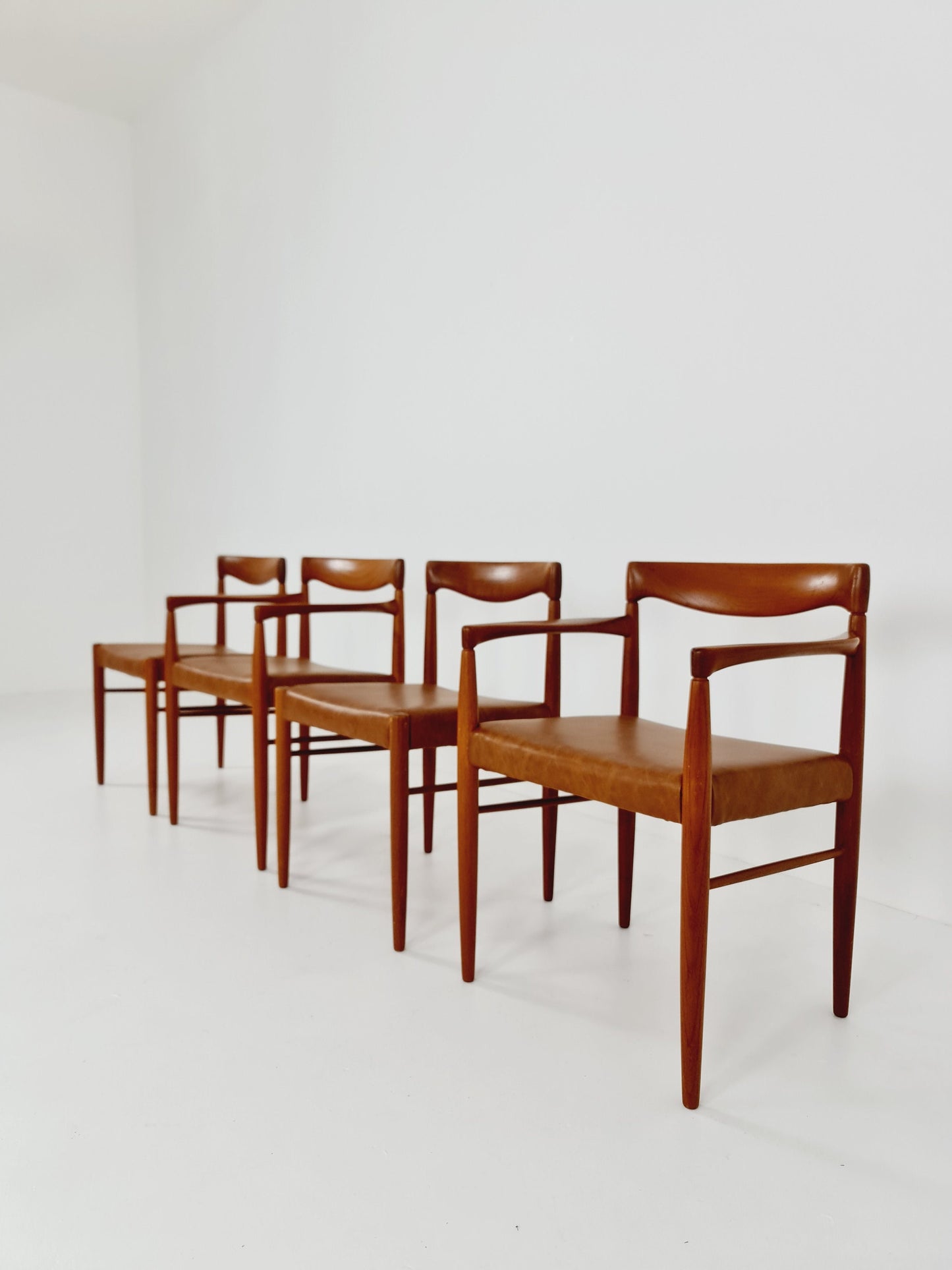 Danish teak & congac faux leder fabric dining chairs by H. W. Klein for Bramin, 1960s, set of 4