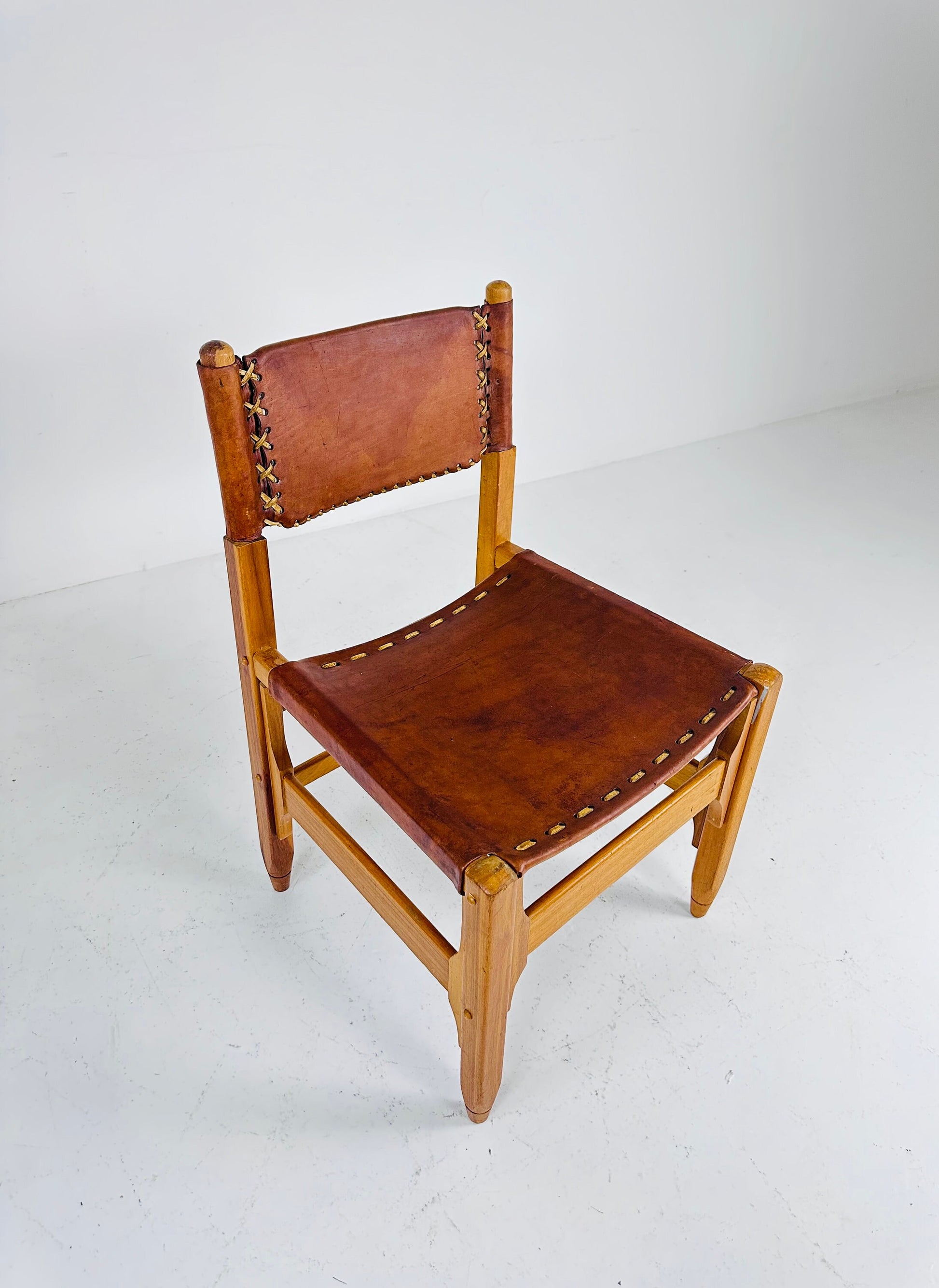 Vintage cognac leather hunting lodge chairs designed by Biermann Werner for Arte Sano 1960