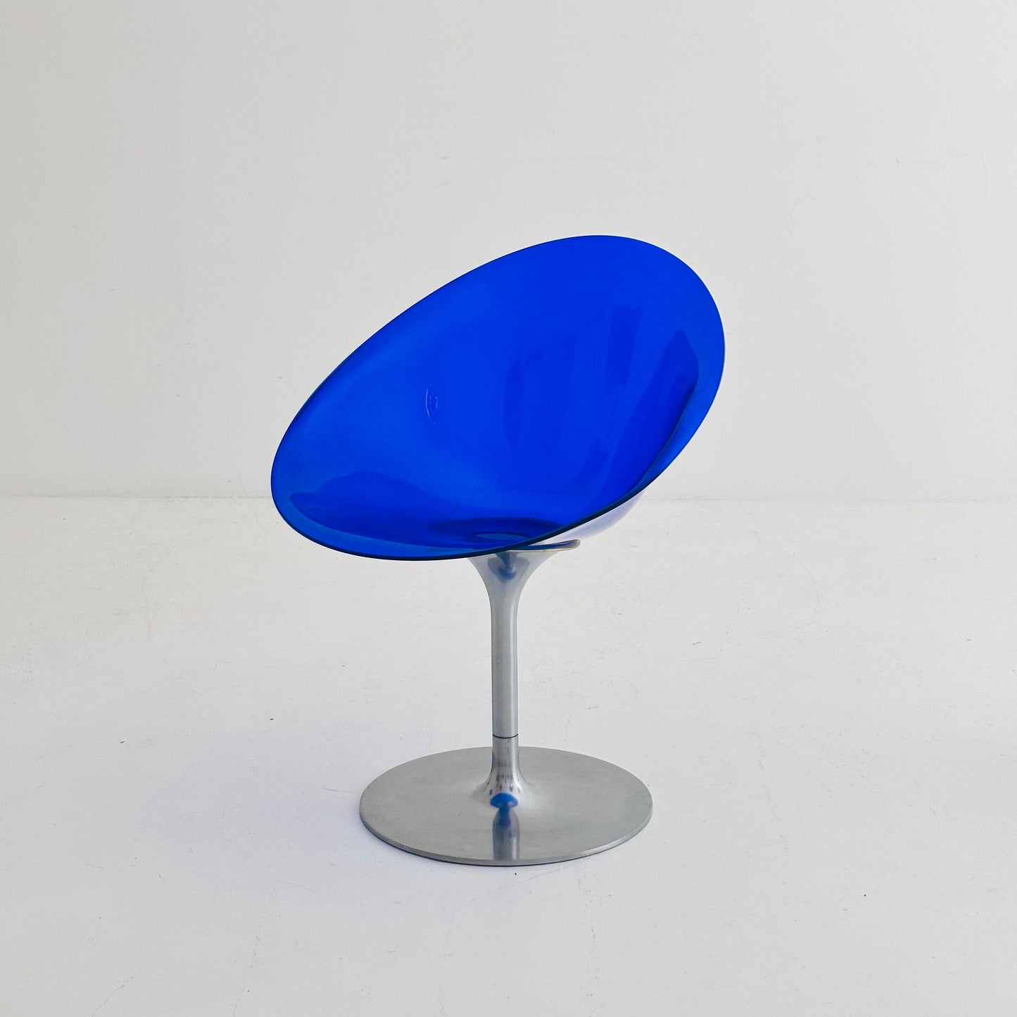 yellow Eros chair with aluminum swivel base by Philippe Starck for Kartell. Italy.