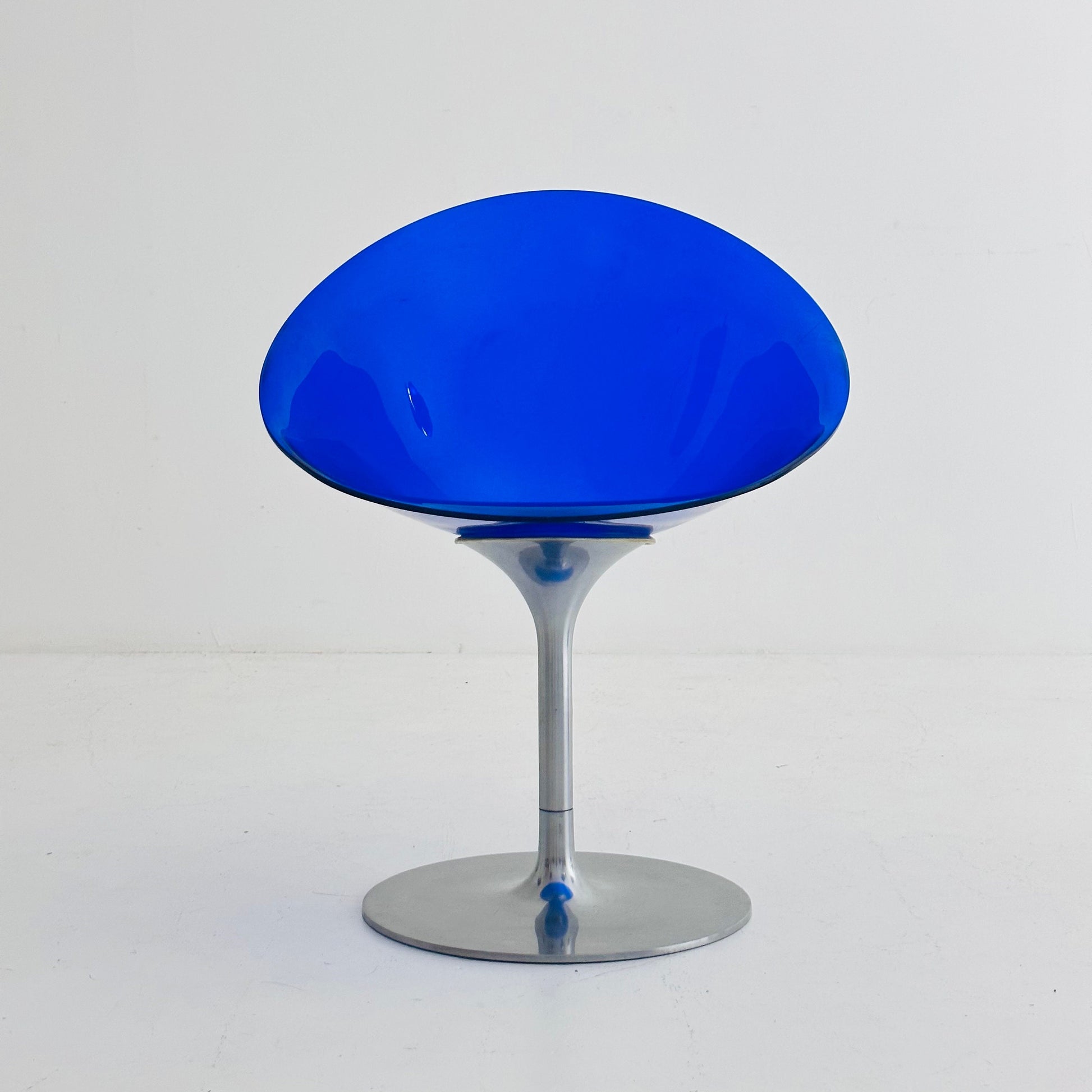 yellow Eros chair with aluminum swivel base by Philippe Starck for Kartell. Italy.