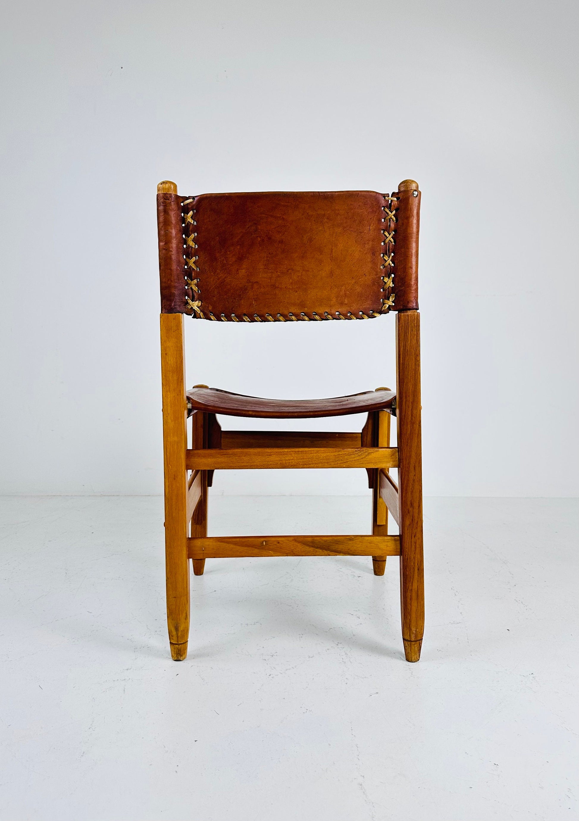 Vintage cognac leather hunting lodge chairs designed by Biermann Werner for Arte Sano 1960