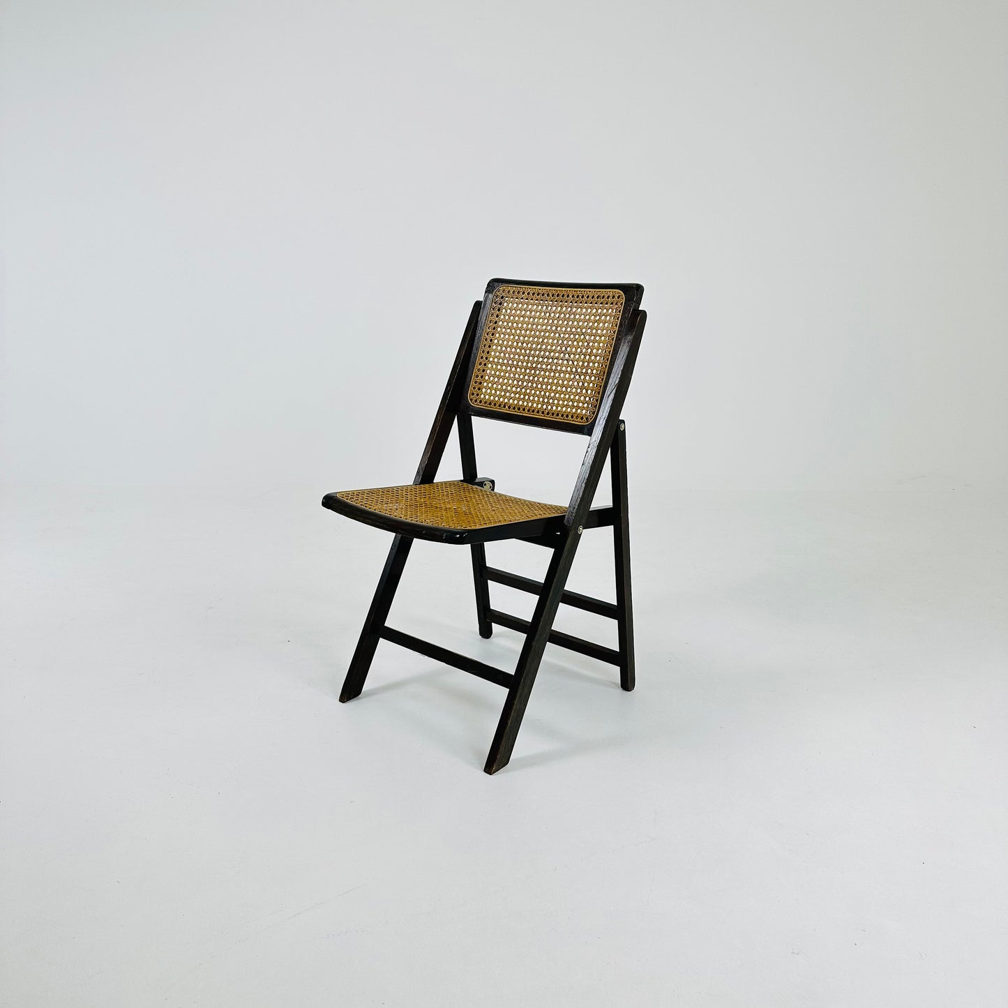 Rattan vintage folding chair Gilles ebonized Italy, 1960s