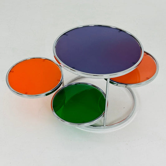 chrome and colorful glass coffee table with 3 swiveling tiers by Kare design 