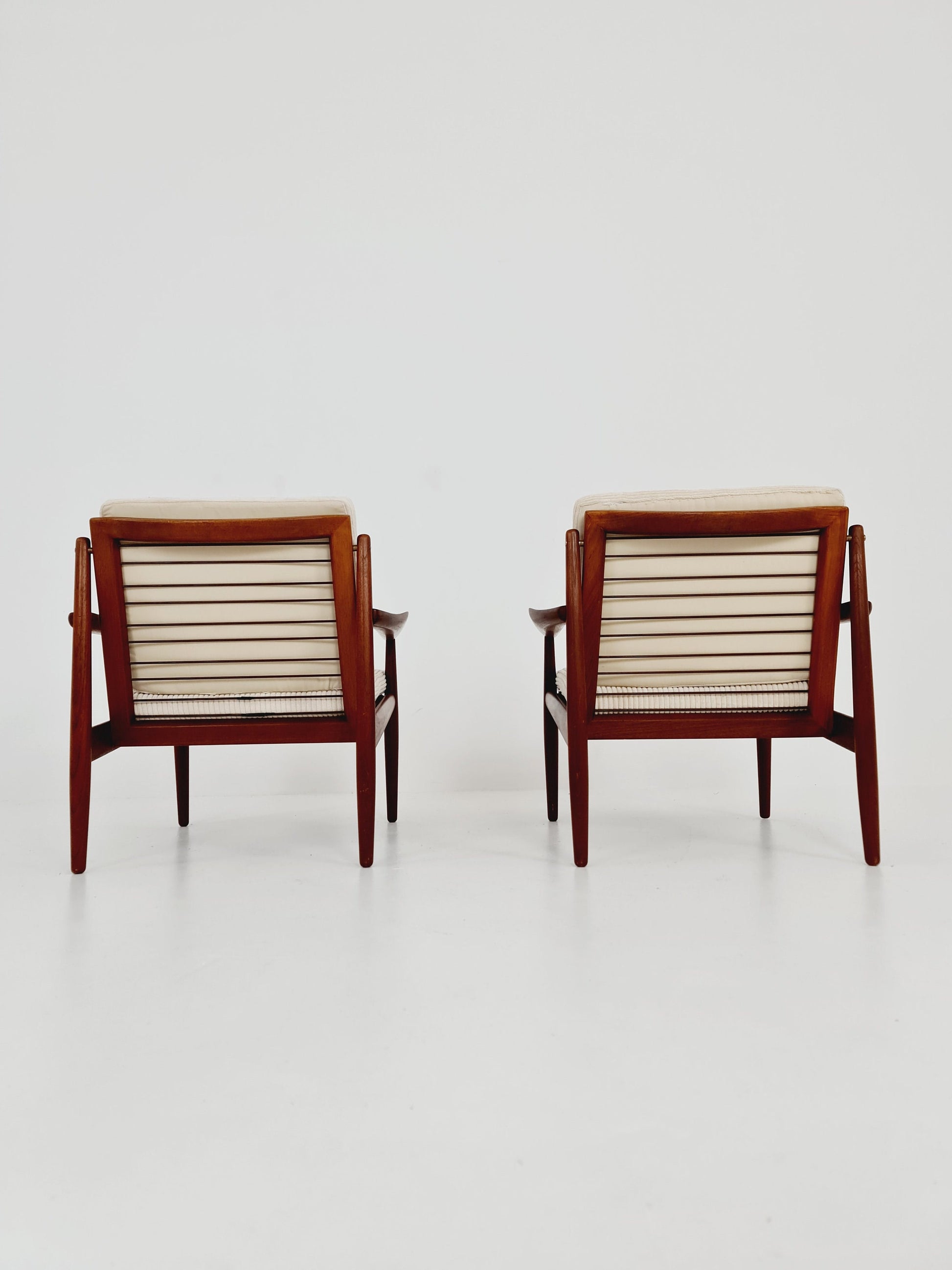 Mid century easy lounge chairs by Grete Jalk, Denmark, teak & brass, 19560s, Set of 2