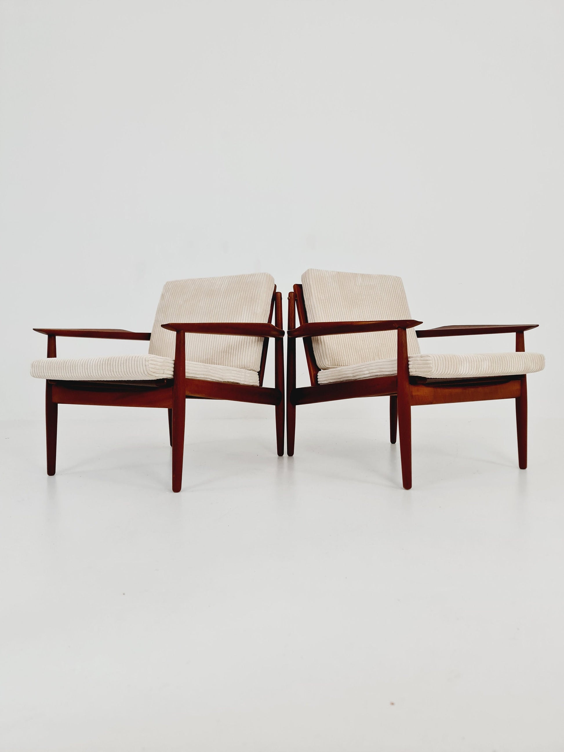 Mid century easy lounge chairs by Grete Jalk, Denmark, teak & brass, 19560s, Set of 2