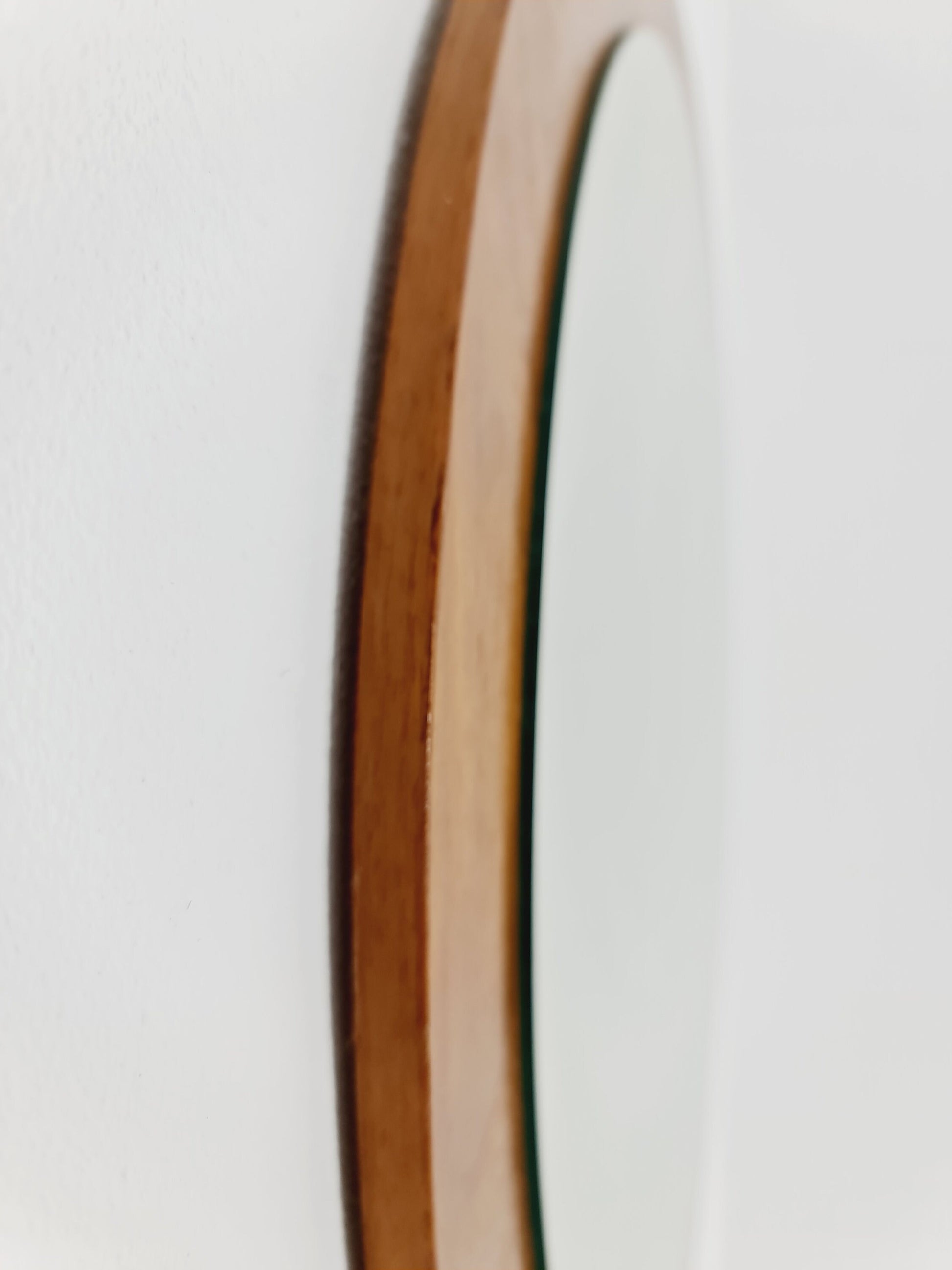 Mid Century round teak mirror from the 60s