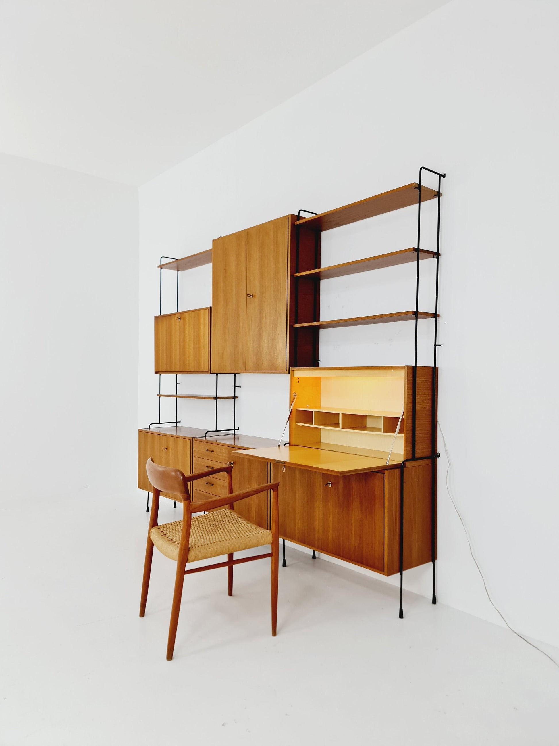 Mid century Teak 11 pieces shelving unit by Hilker for Omnia, Germany 1960s