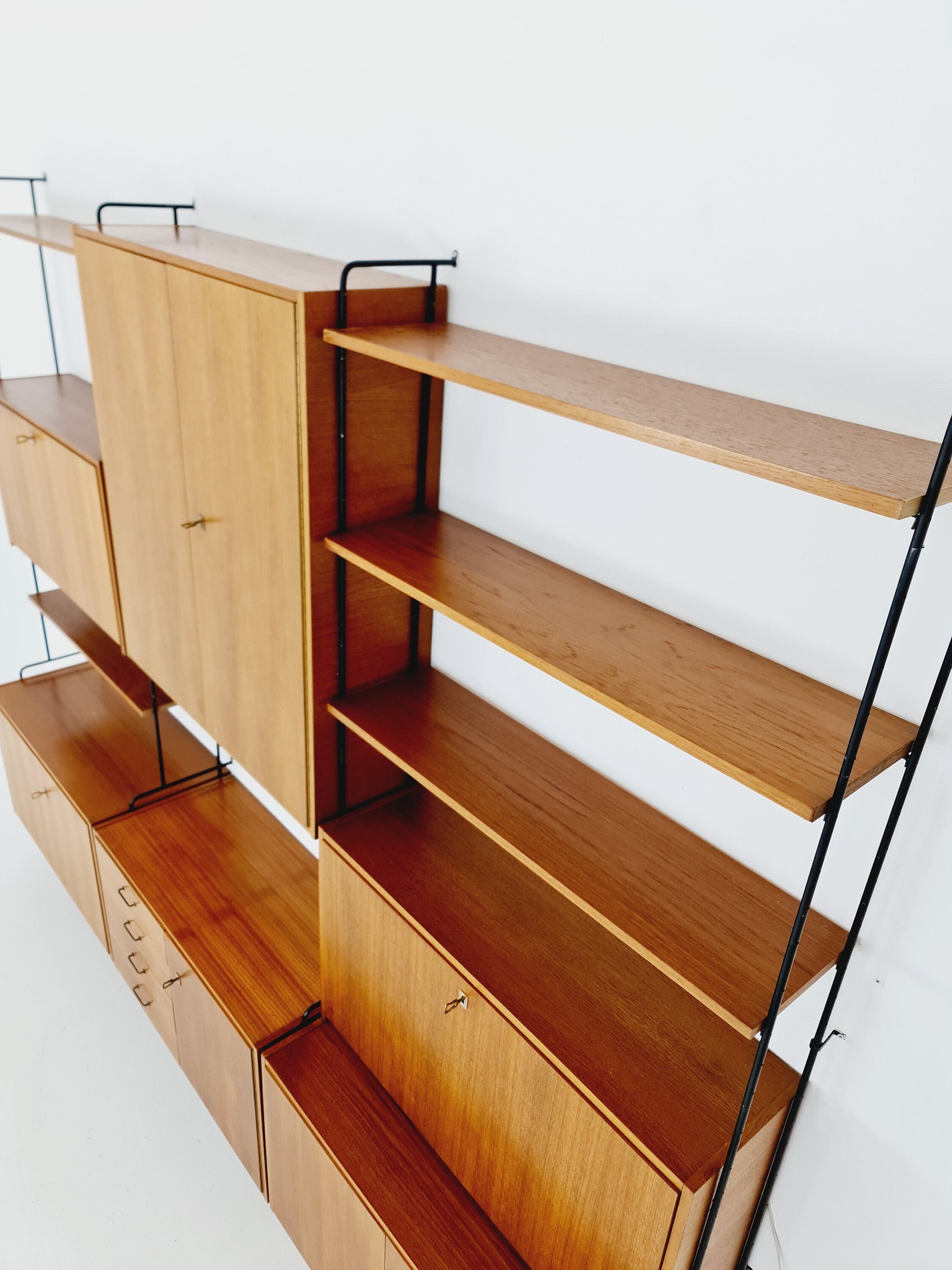 Mid century Teak 11 pieces shelving unit by Hilker for Omnia, Germany 1960s