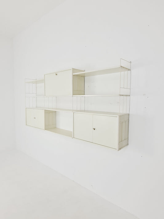 Wall-hanging String shelf-system, bookcase with bar cabinetby WHB Germany, 1950s