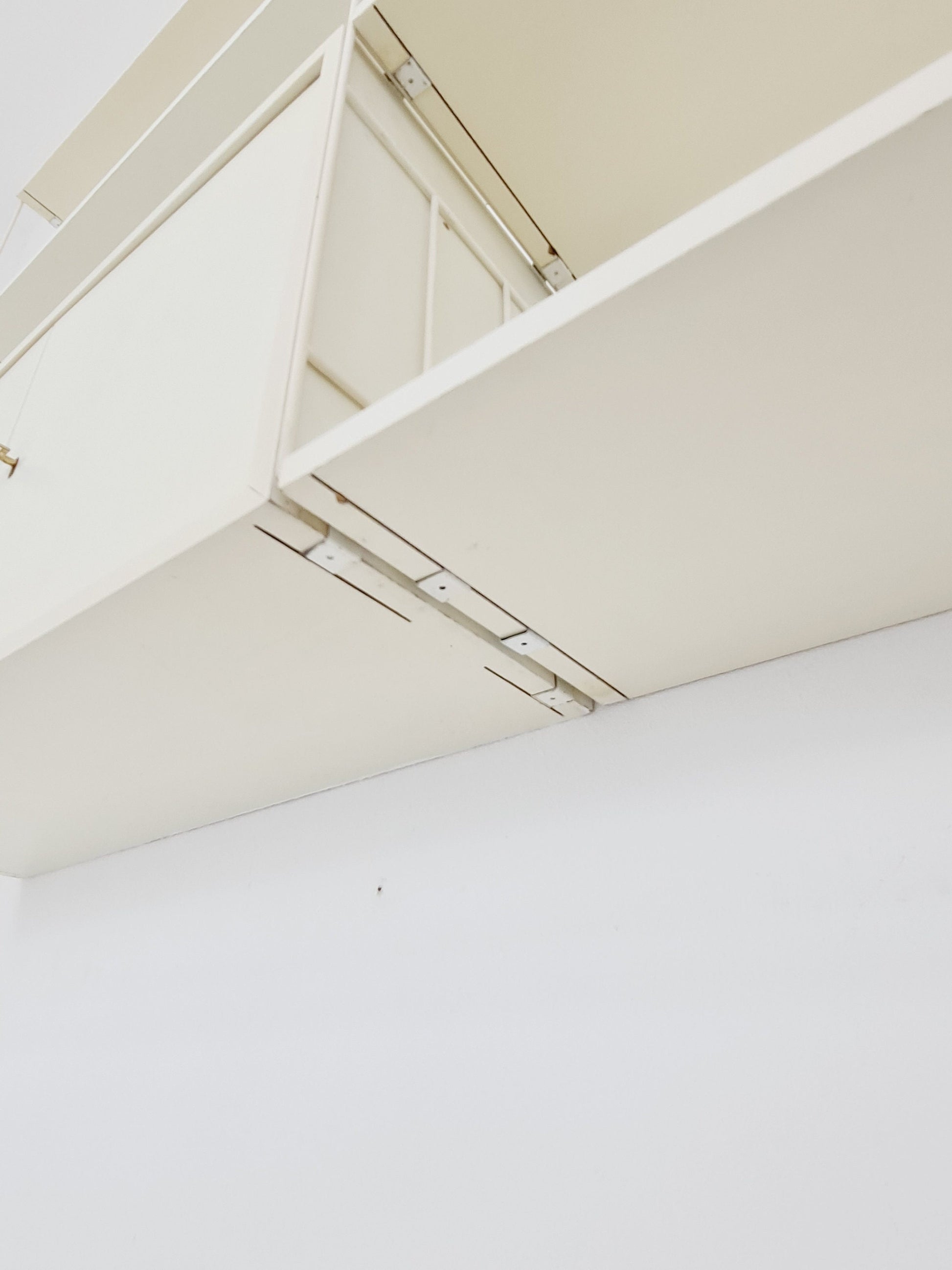 Wall-hanging String shelf-system, bookcase with bar cabinetby WHB Germany, 1950s