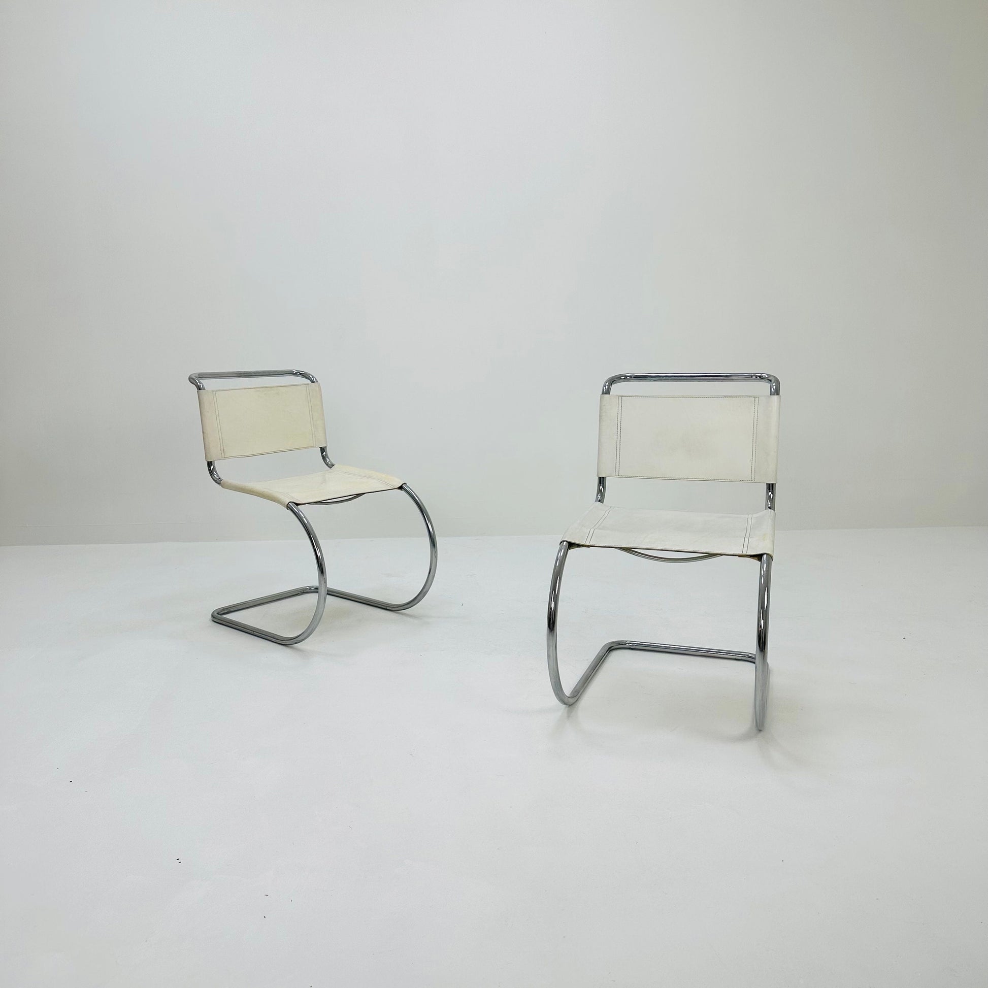 Set of 2 MR10 lounge white leather chairs design by Ludwig Mies van der Rohe , 1980s