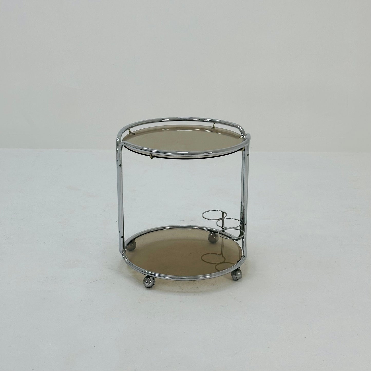 Mid century Chrome bar cart/serving trolley. Smoked glass Bauhaus Italy 1980s