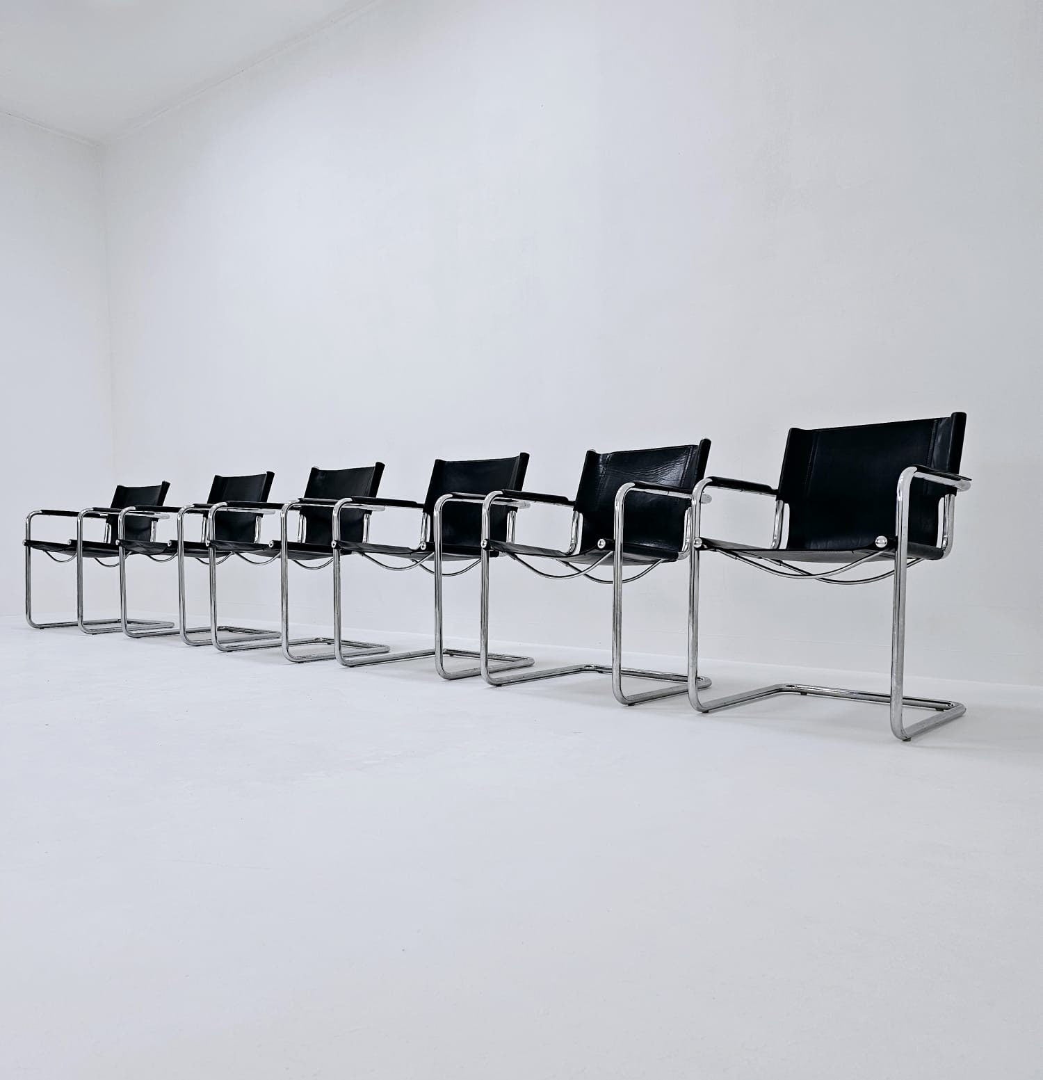 Set of 6 Matteo Grassi visitor chairs in black leather Italy 1980s
