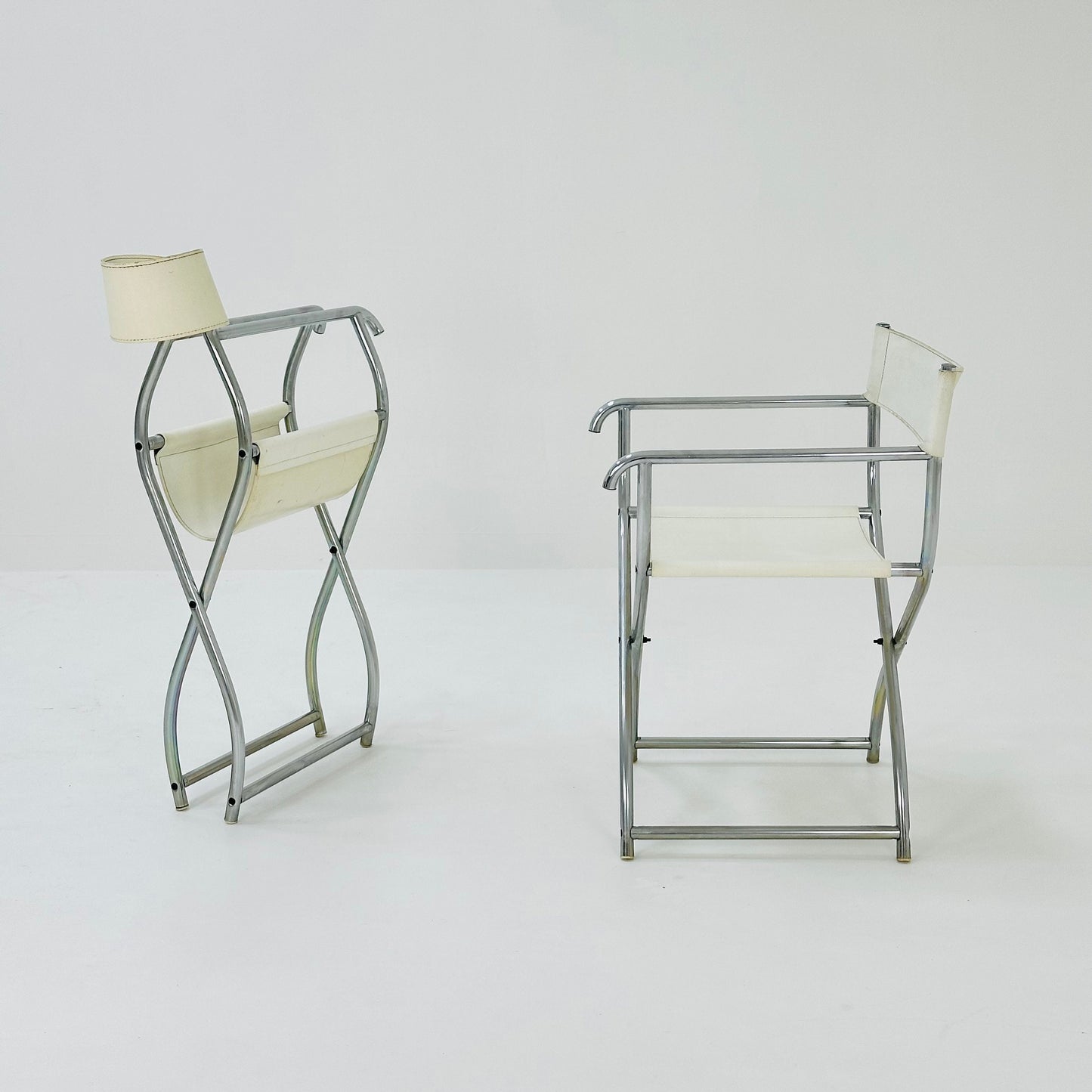 set of 2 mid -Century Modern Arrben director's chair in chrome and white leather 1980s